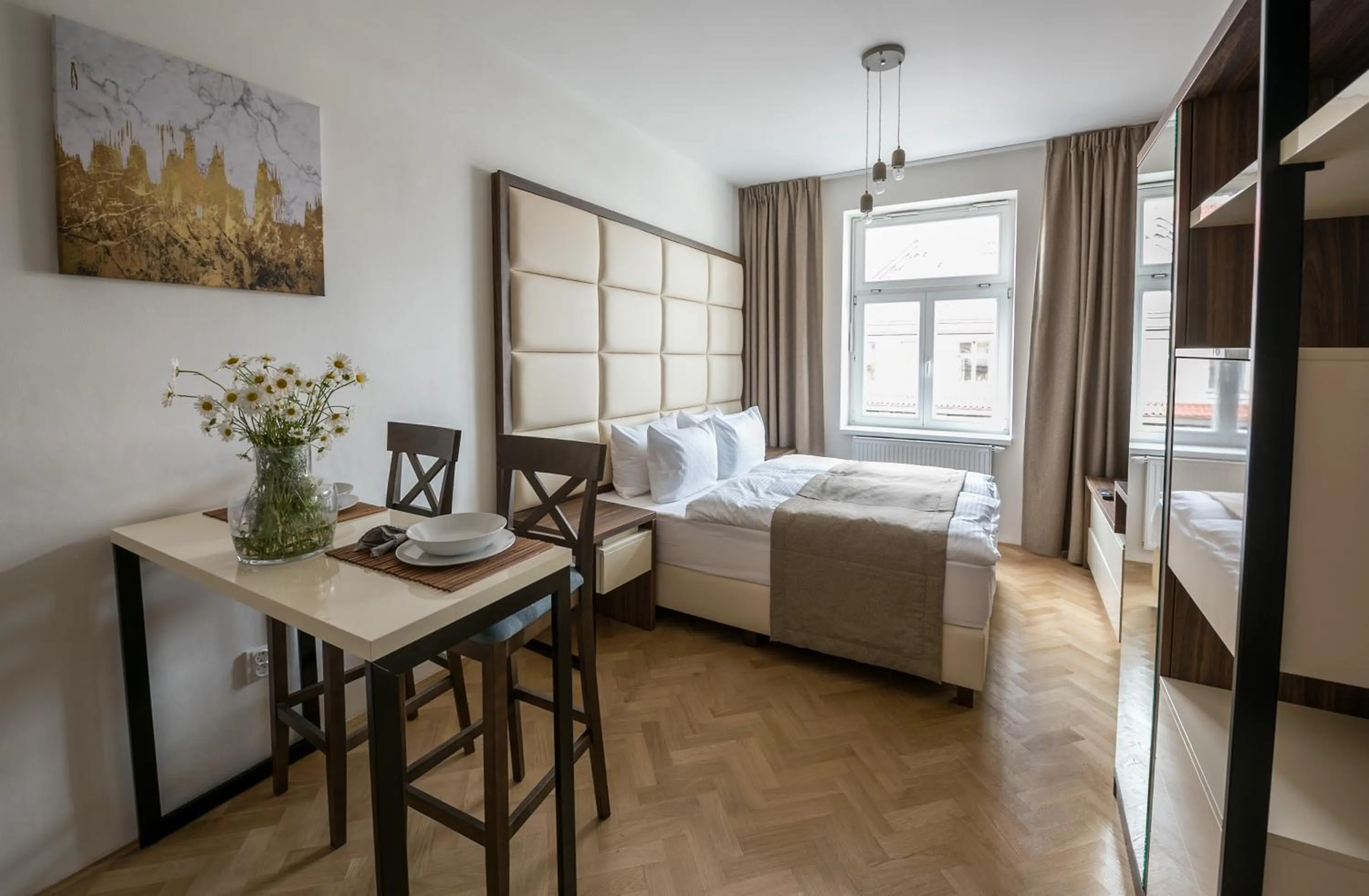 Bed in Letna Garden Suites