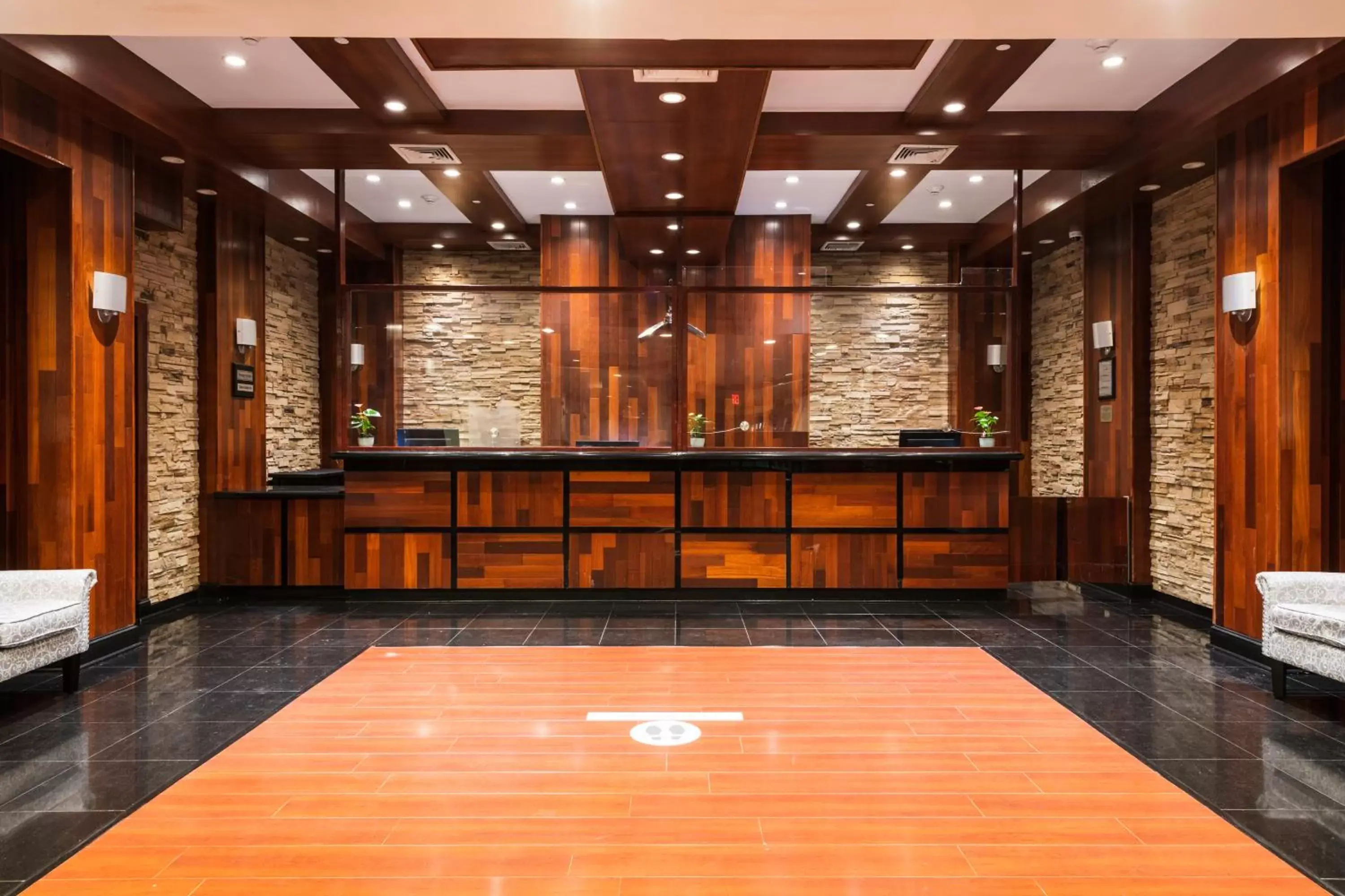 Lobby or reception in Crowne Plaza Newark Airport by IHG Lobby or reception in Crowne Plaza Newark Airport by IHG