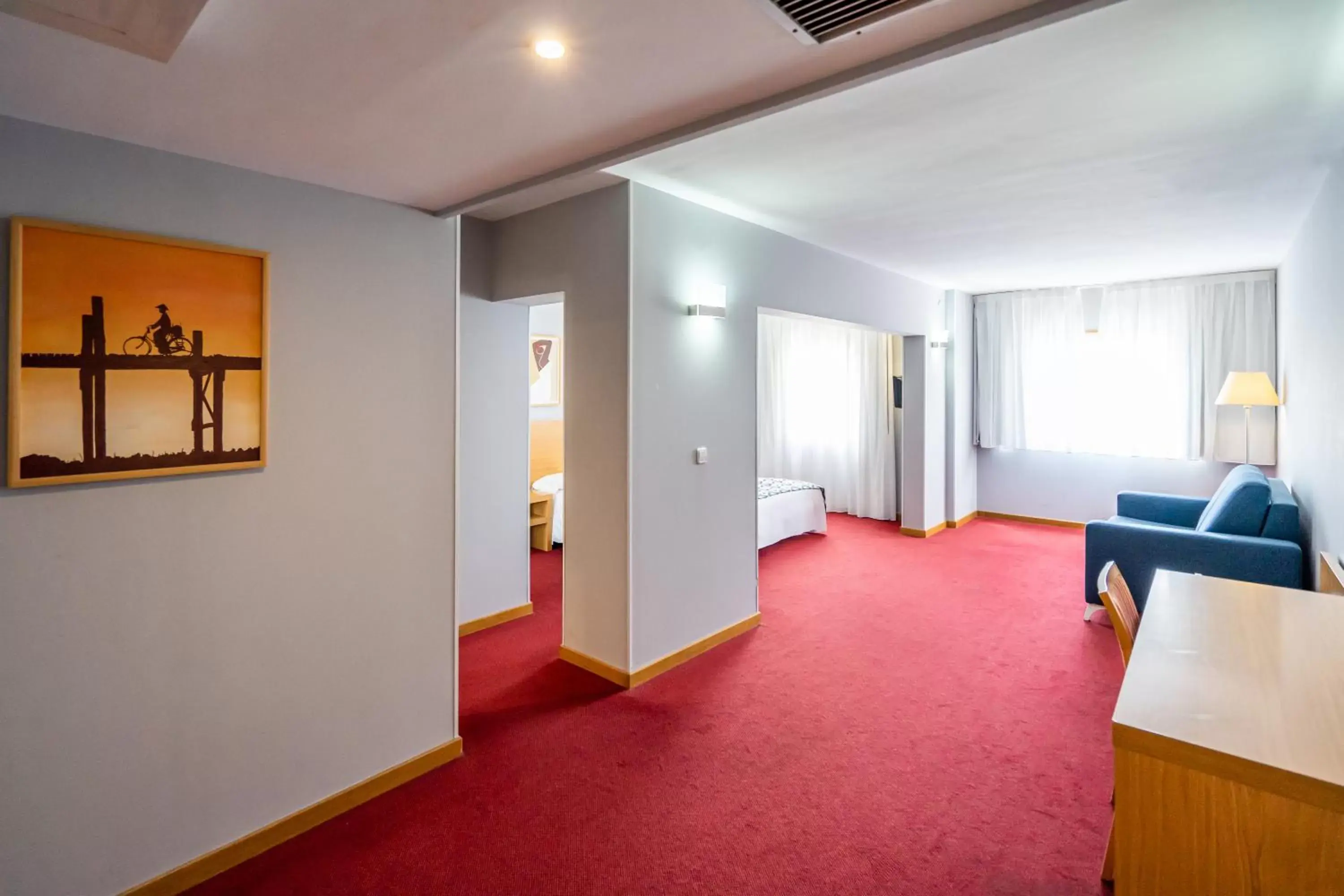 Bed, Seating Area in Hotel Beleret