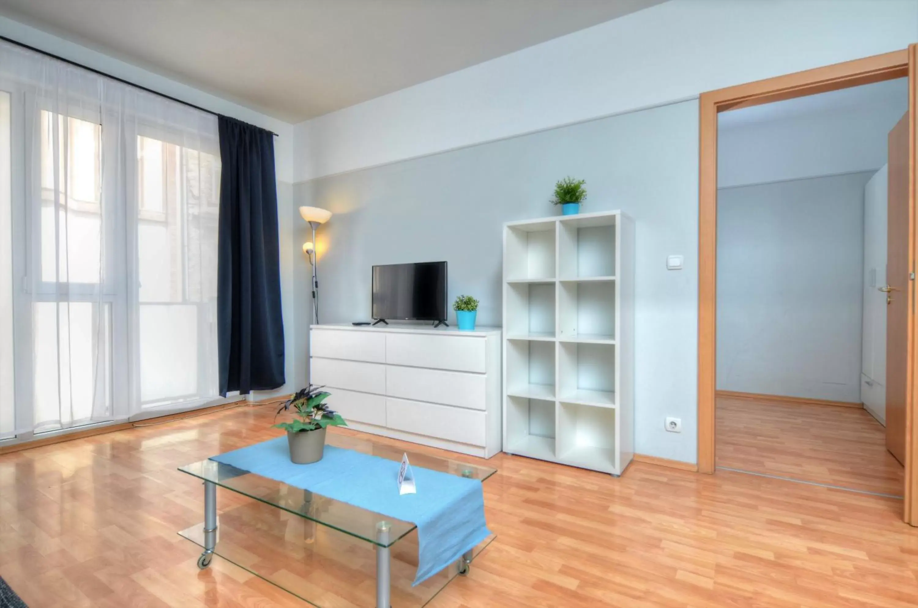 Living room, TV/Entertainment Center in Agape Apartments