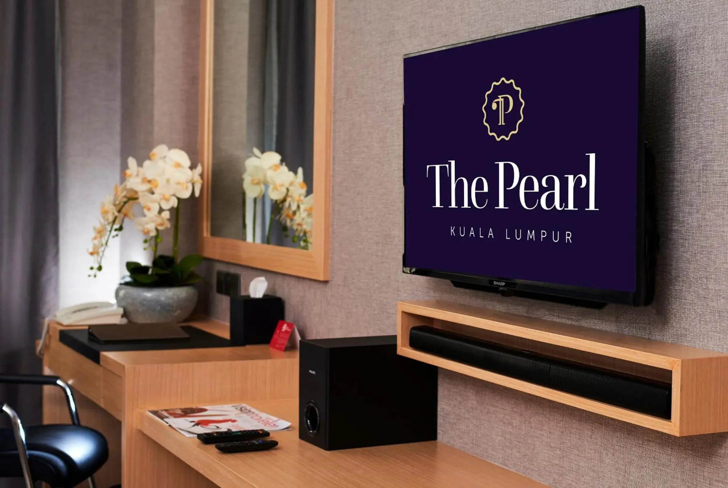 TV and multimedia, TV/Entertainment Center in Pearl International Hotel