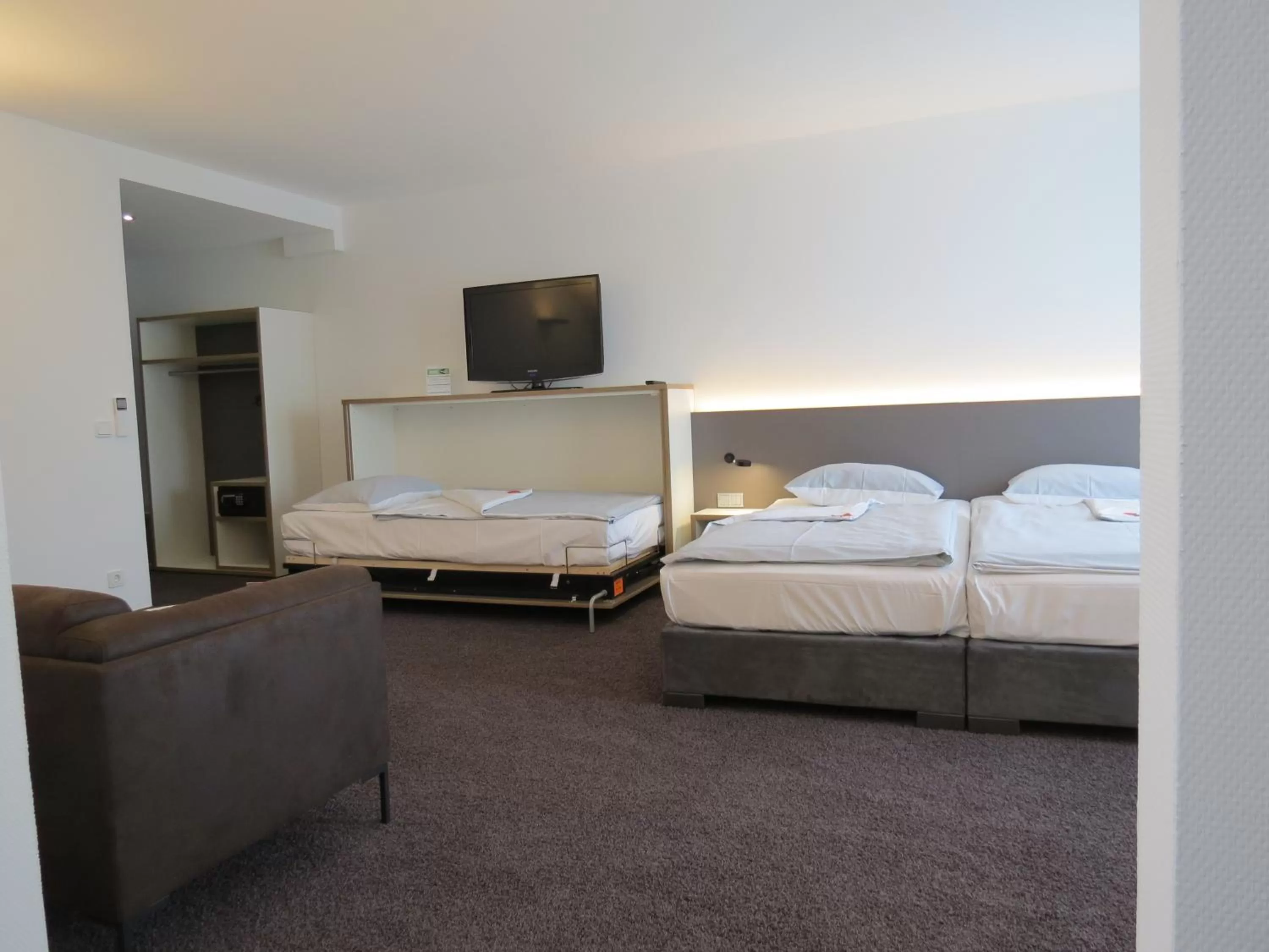 Bed in Comfor Hotel Ulm City