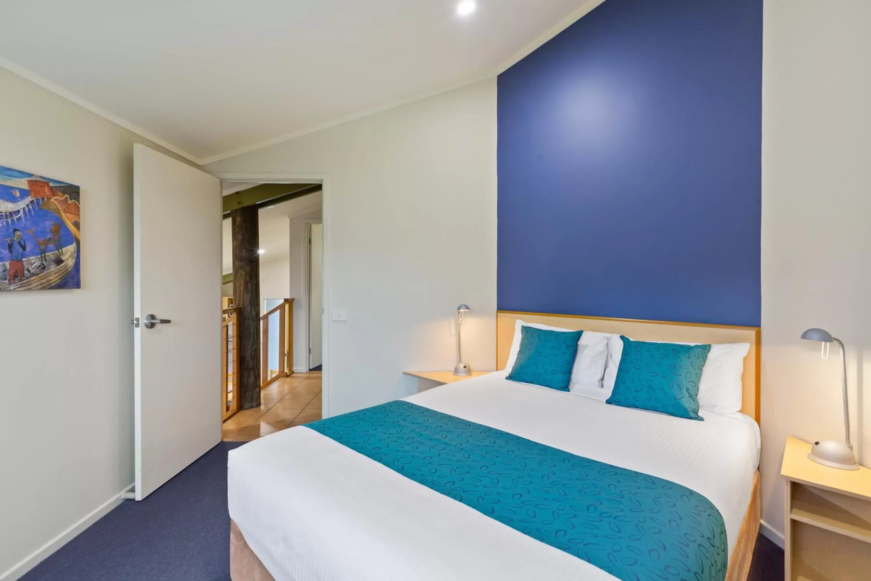 Bed in Tathra Beach House Holiday Apartments