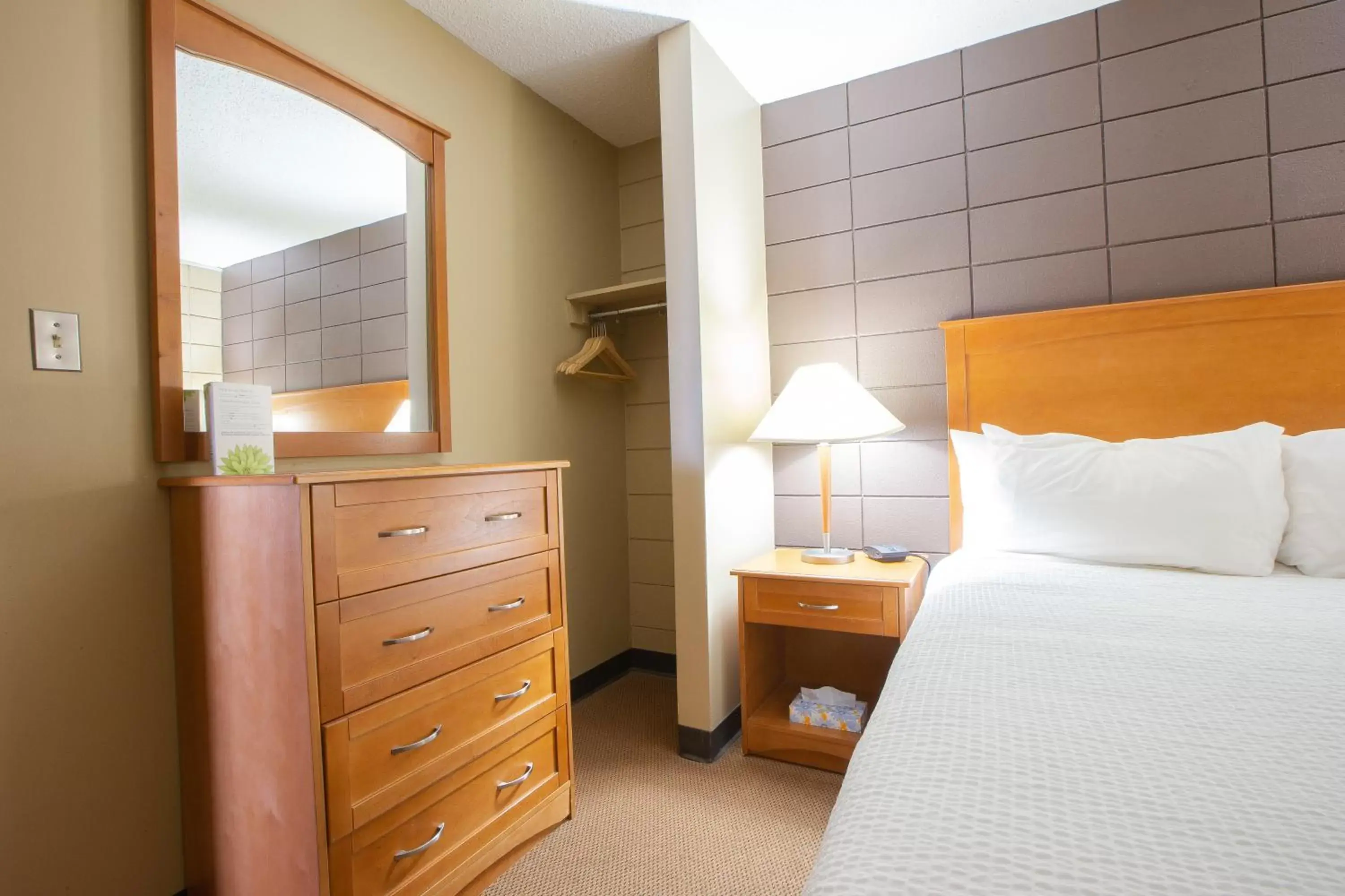 Bed in Neighbourhood Inn Hotels in Bonnyville