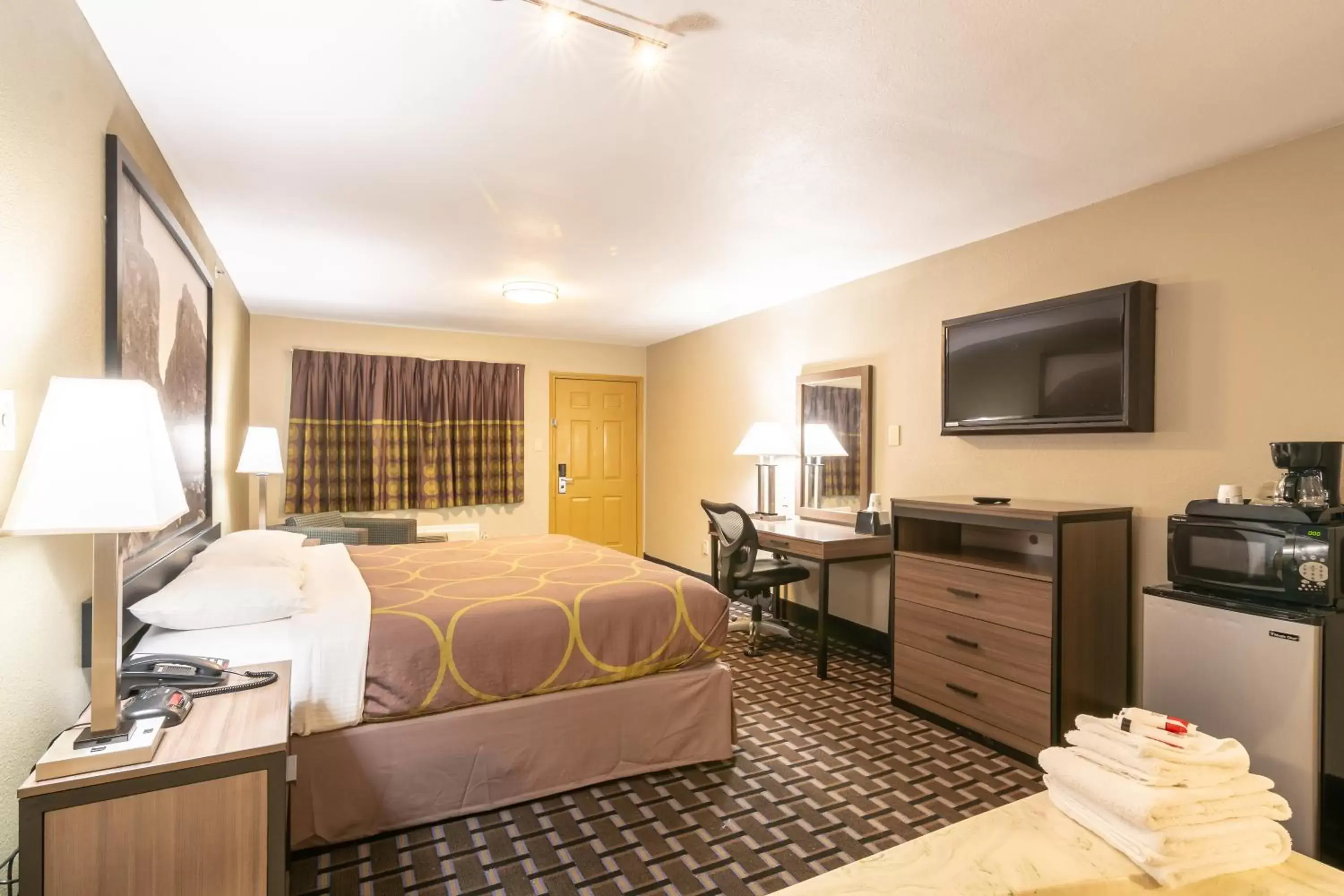 Bed in Super 8 by Wyndham Dallas East