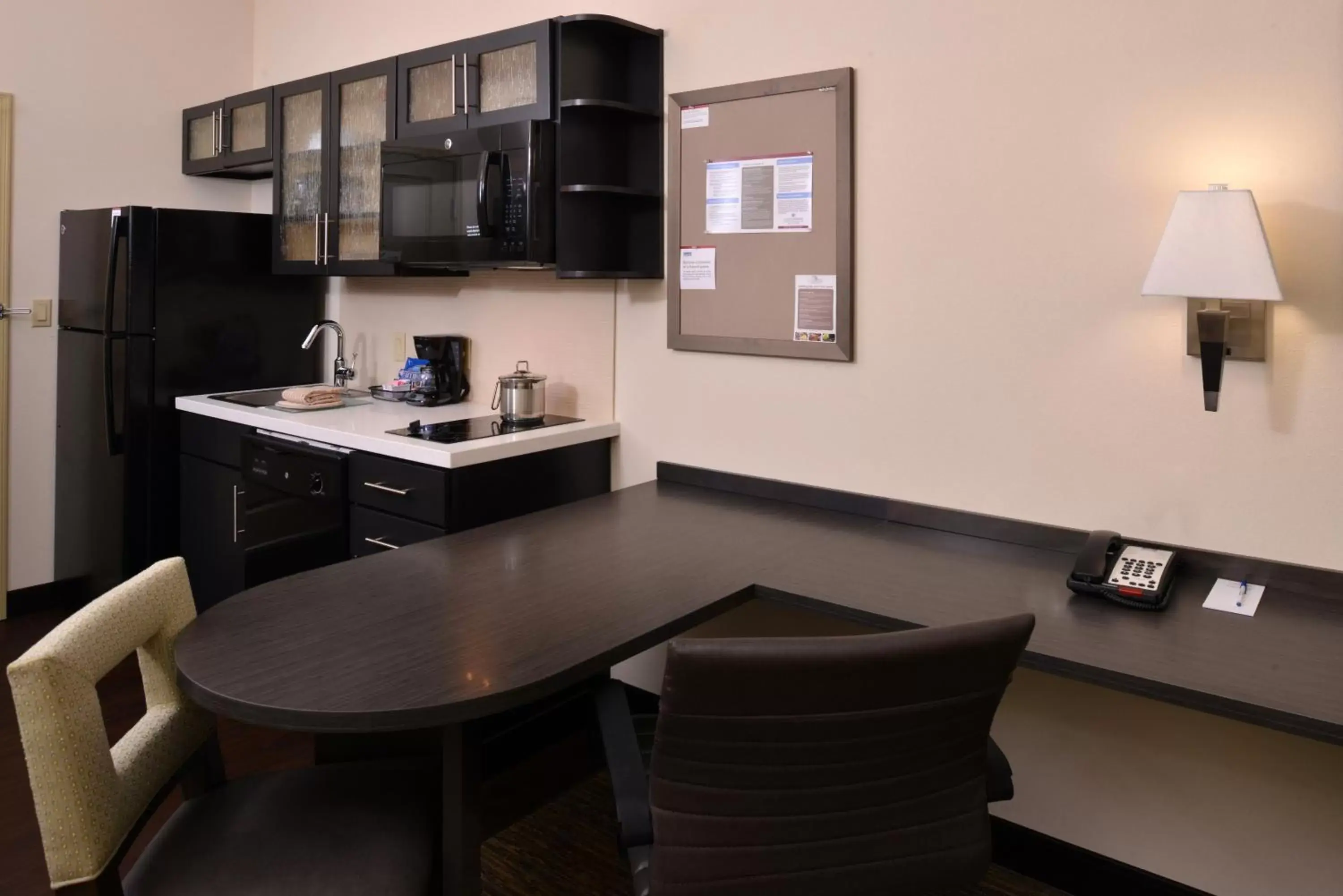 Photo of the whole room, Kitchen/Kitchenette in Candlewood Suites MORGANTOWN-UNIV WEST VIRGINIA, an IHG Hotel