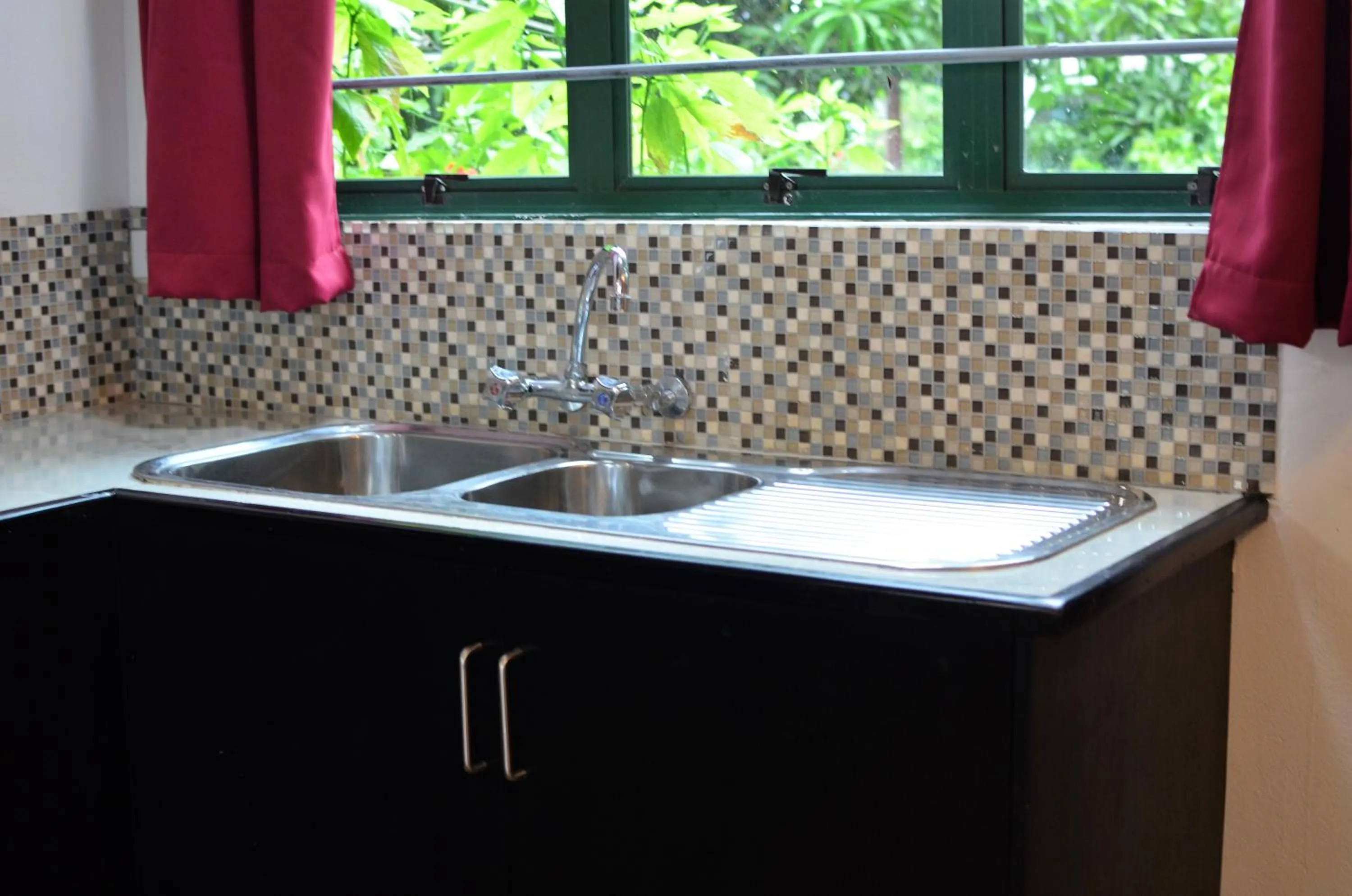 Kitchen or kitchenette in Grand West Villas