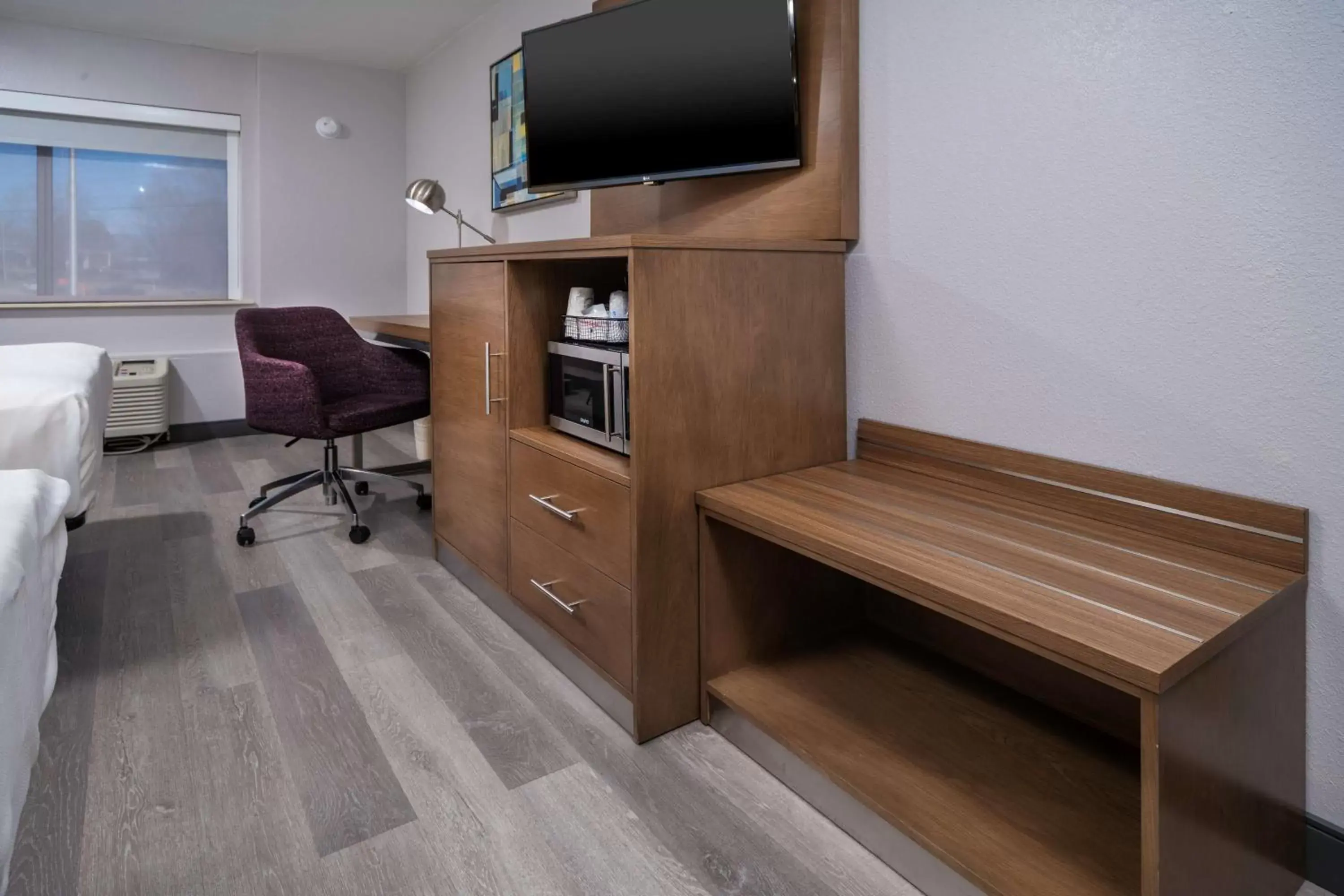 Photo of the whole room, TV/Entertainment Center in Best Western Plus Raleigh Crabtree Valley Hotel