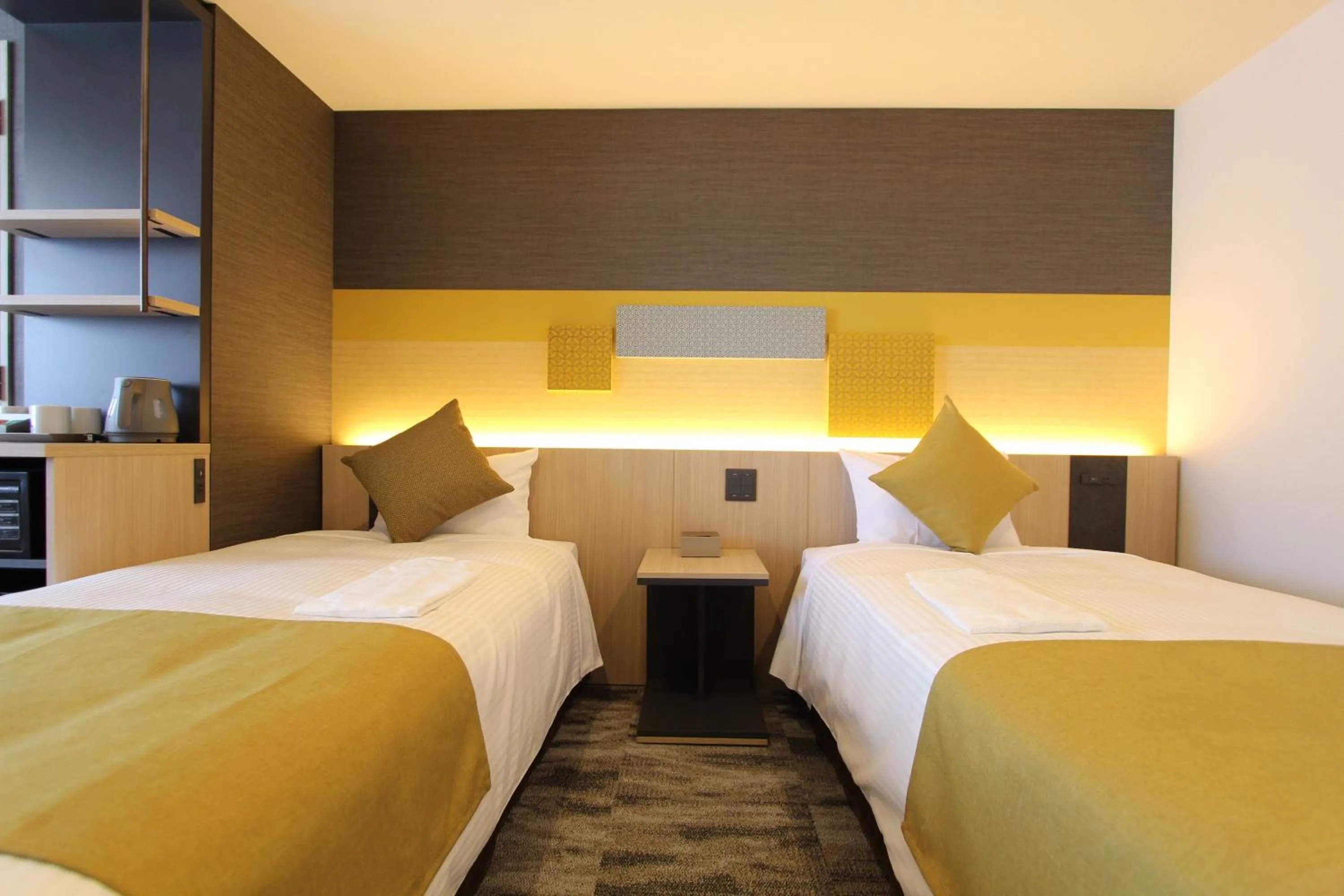 Bed in KOKO HOTEL Tsukiji Ginza