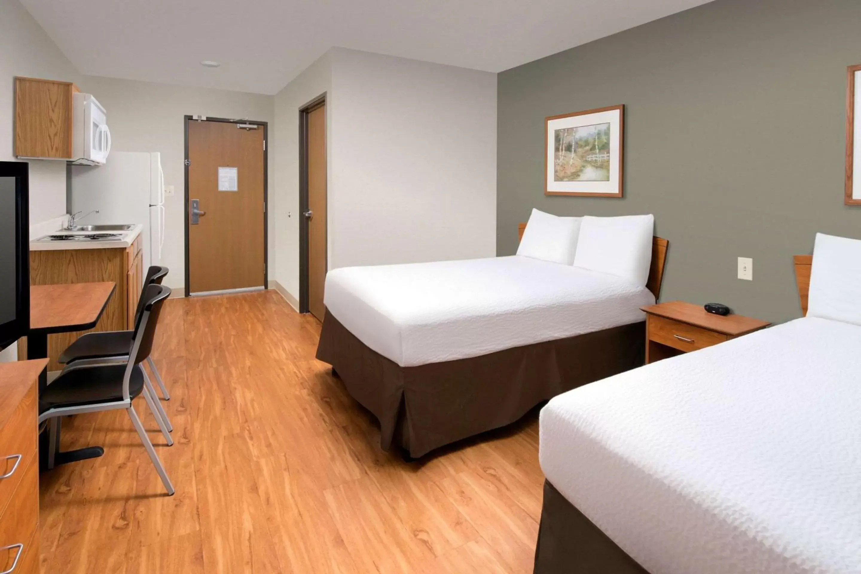 Photo of the whole room, Bed in WoodSpring Suites St Louis Arnold