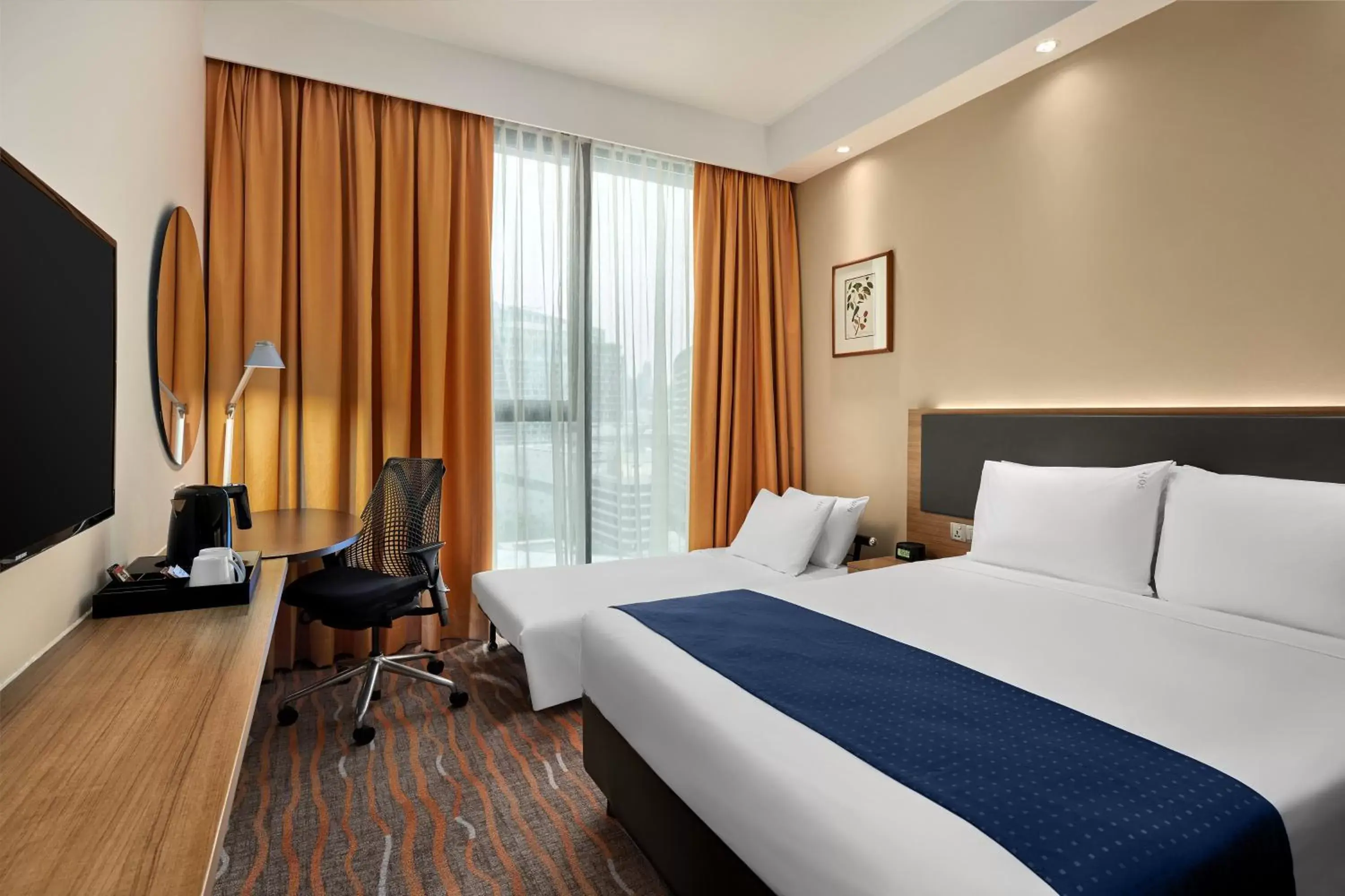 Photo of the whole room, Bed in Holiday Inn Express Singapore Orchard Road, an IHG Hotel