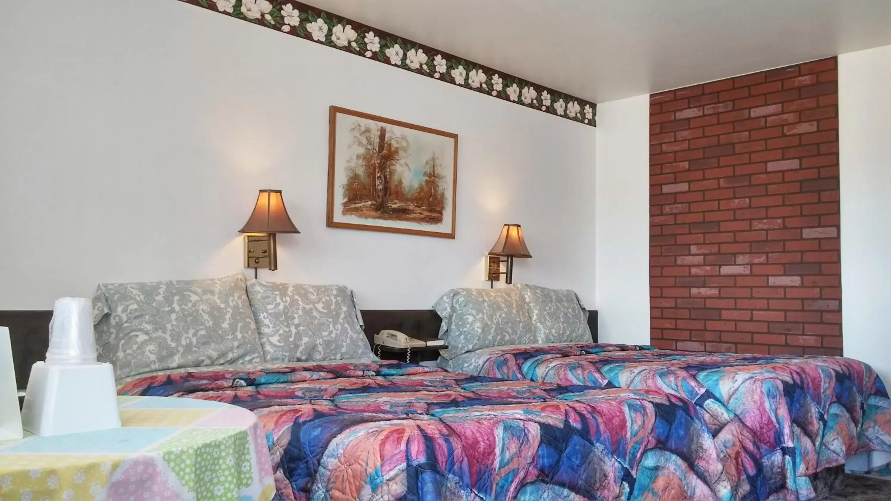 Bed in American Inn Motel Canon City