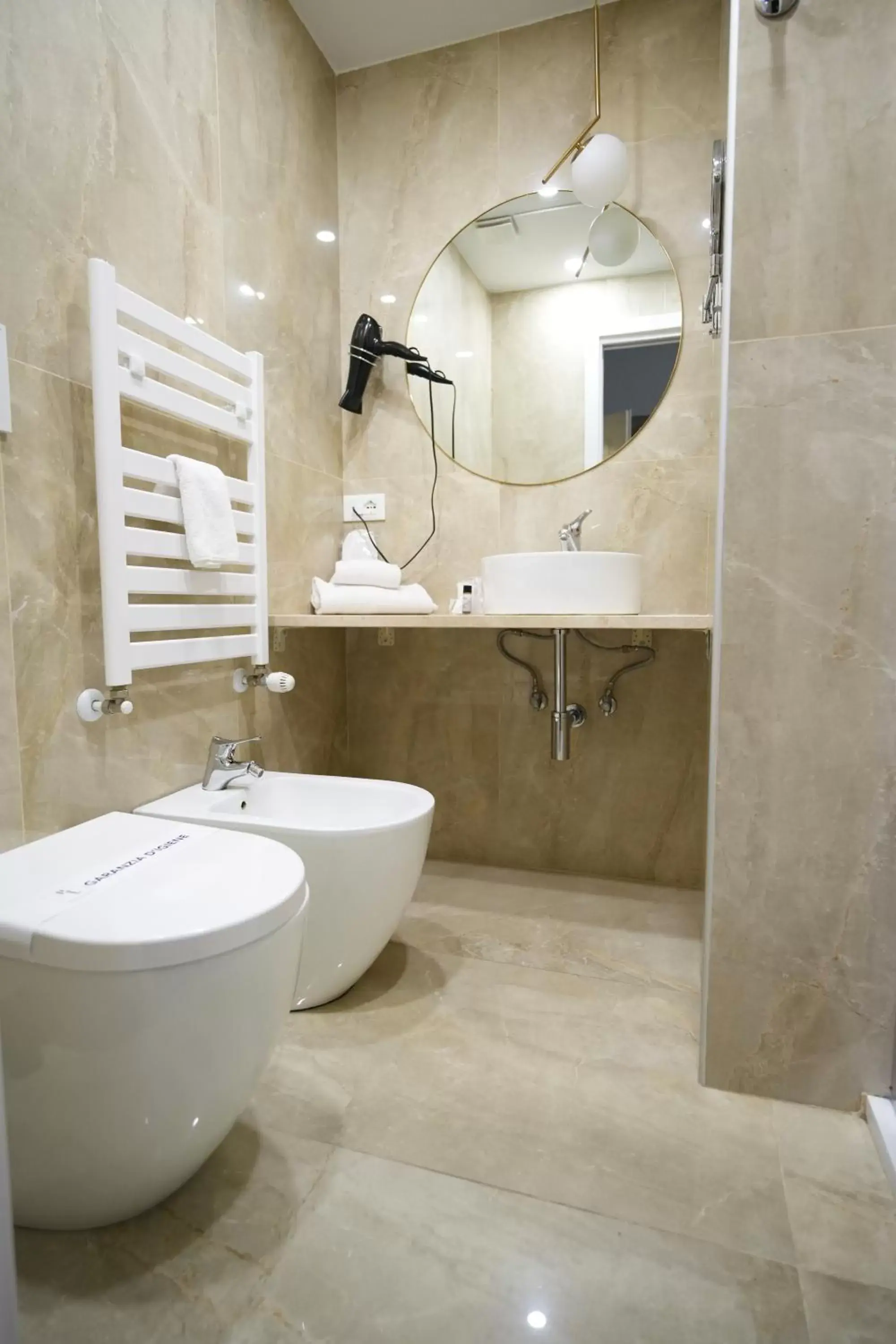 Bathroom in Hotel Urbani