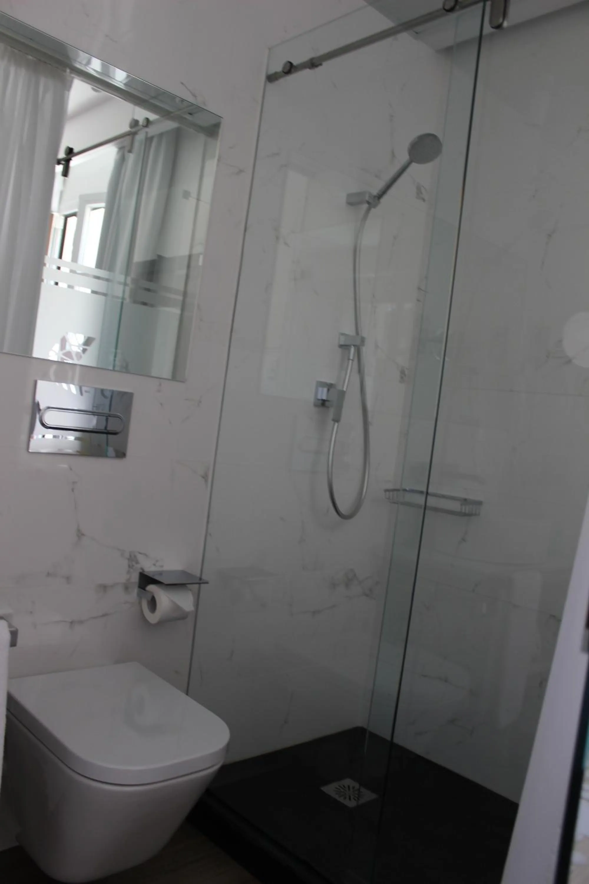 Shower in Hotel Boutique Caireles