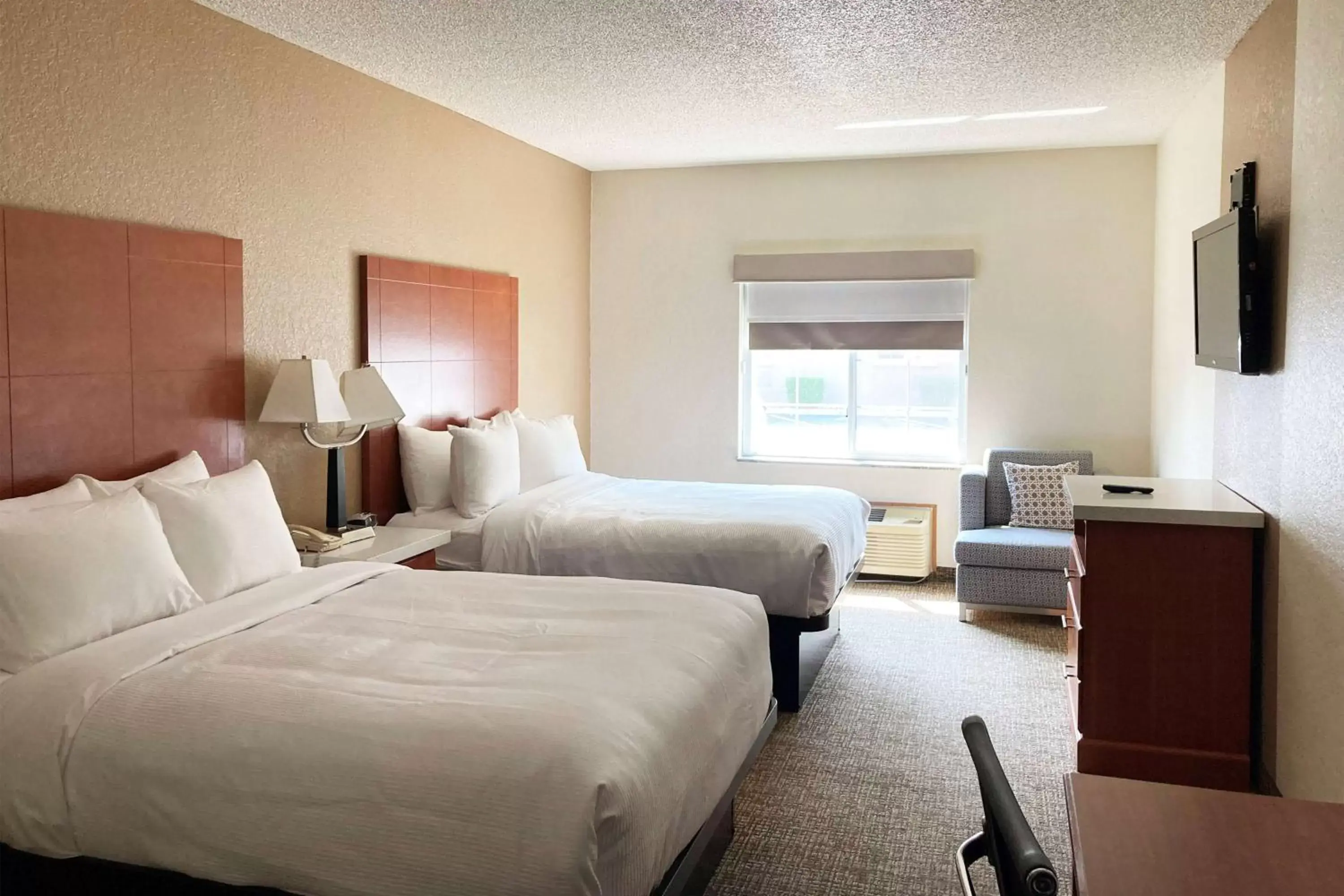 Photo of the whole room, Bed in AmericInn by Wyndham Grinnell