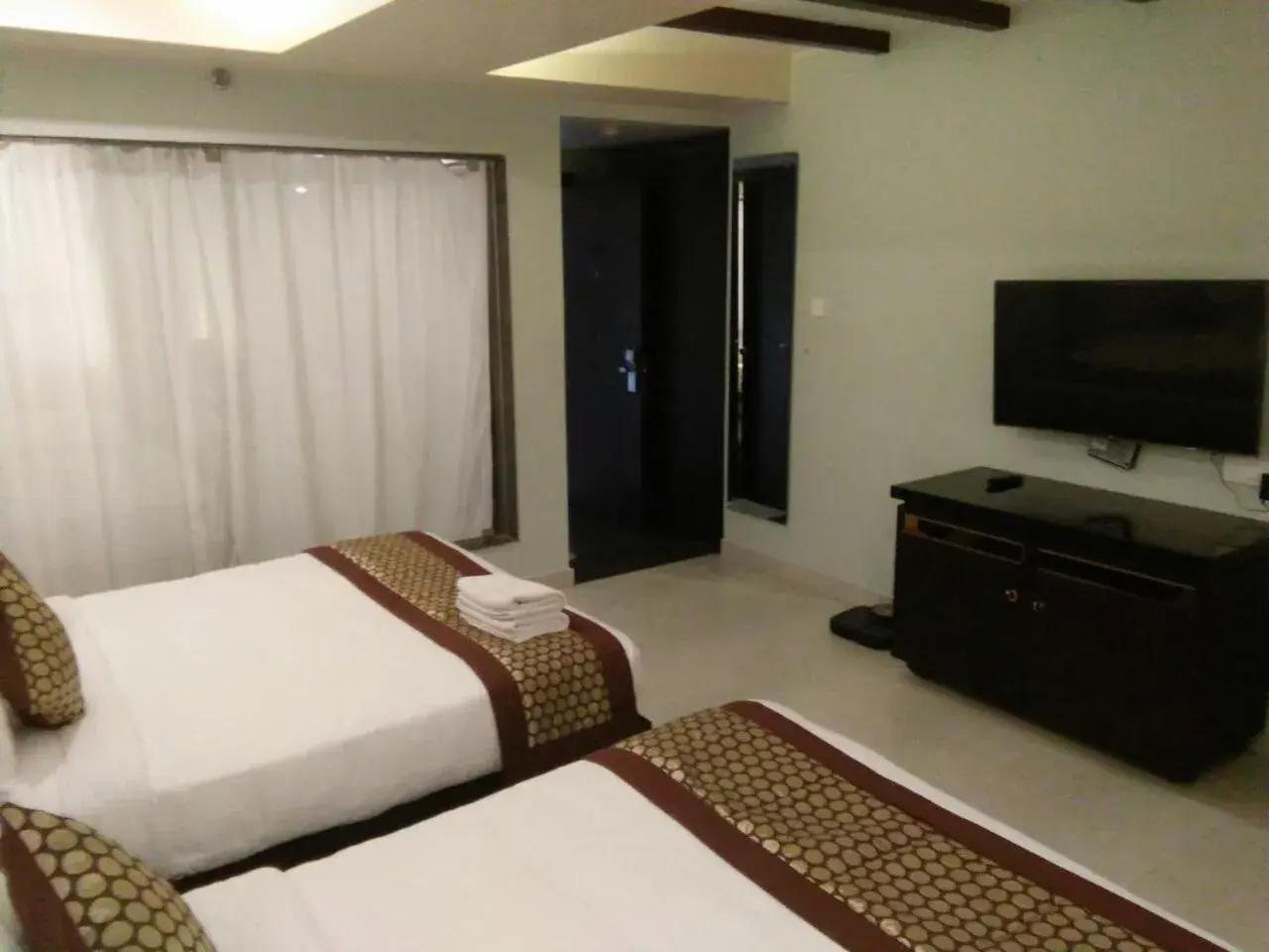 Photo of the whole room, TV/Entertainment Center in Pride Ananya Resort Puri