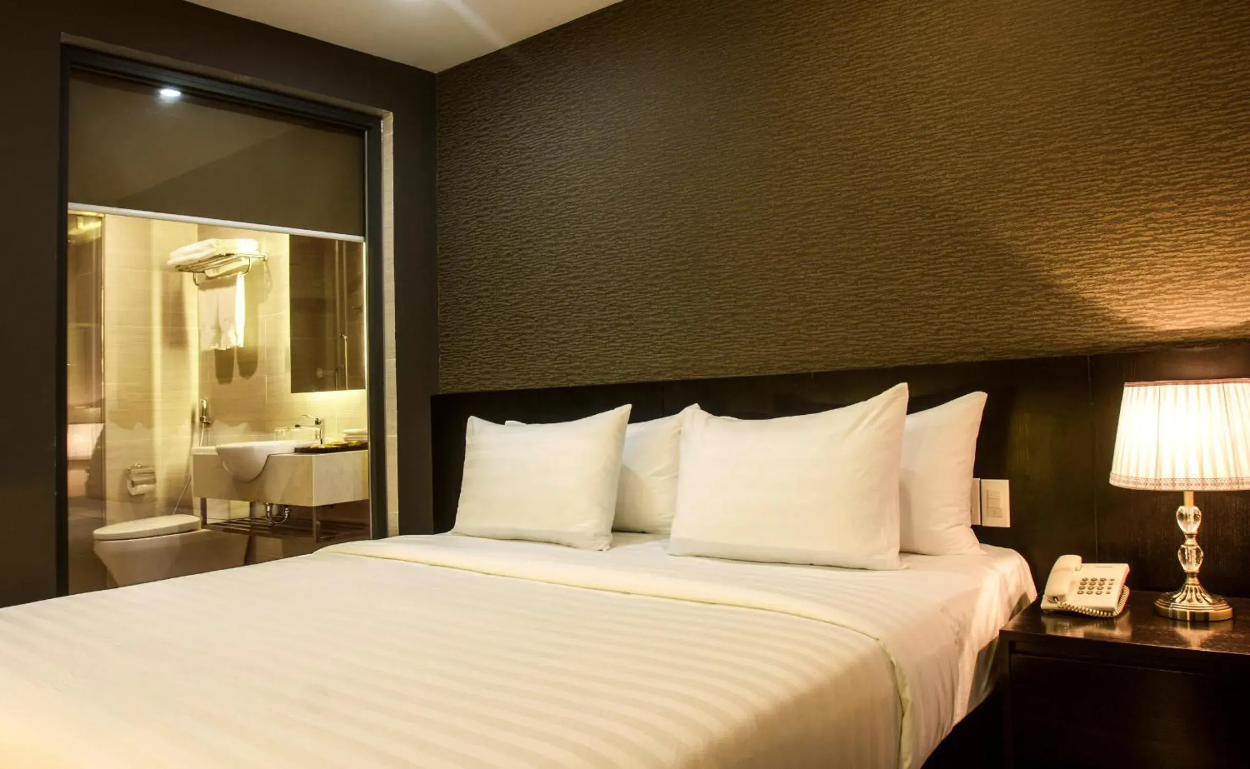 Bed in Golden Nha Trang Hotel Bed in Golden Nha Trang Hotel