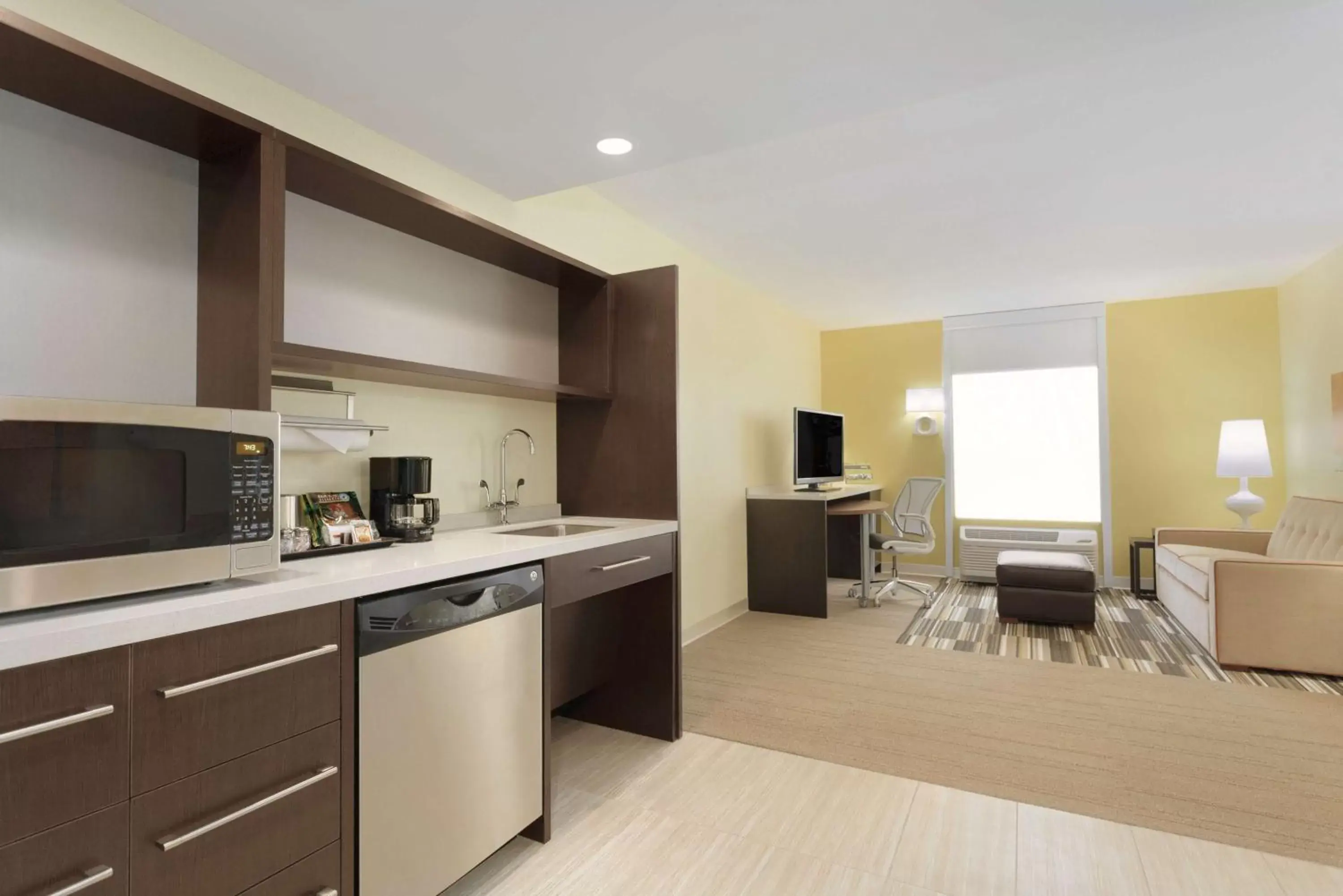 Bed, Kitchen/Kitchenette in Home2 Suites by Hilton Pittsburgh - McCandless, PA