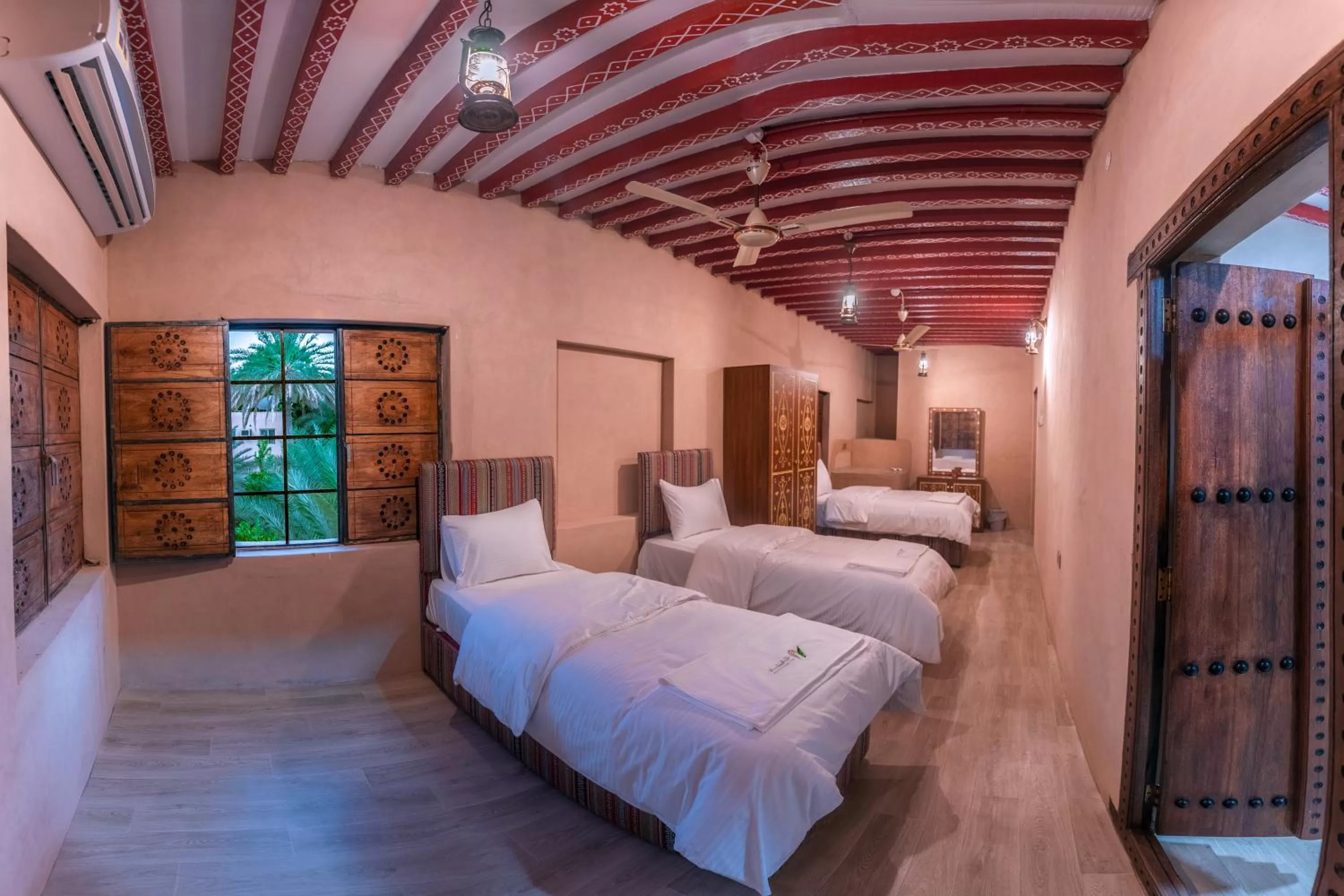 Bed in Bustan inn by Alley Escape