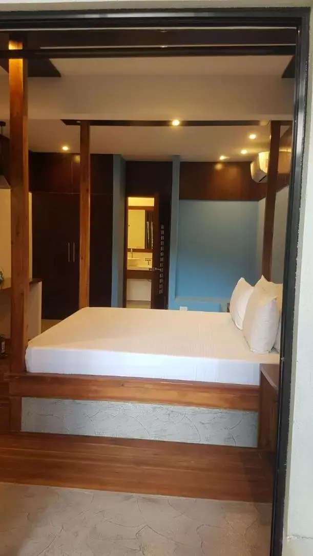 Bed in Mahogany Resort & Spa Bed in Mahogany Resort & Spa