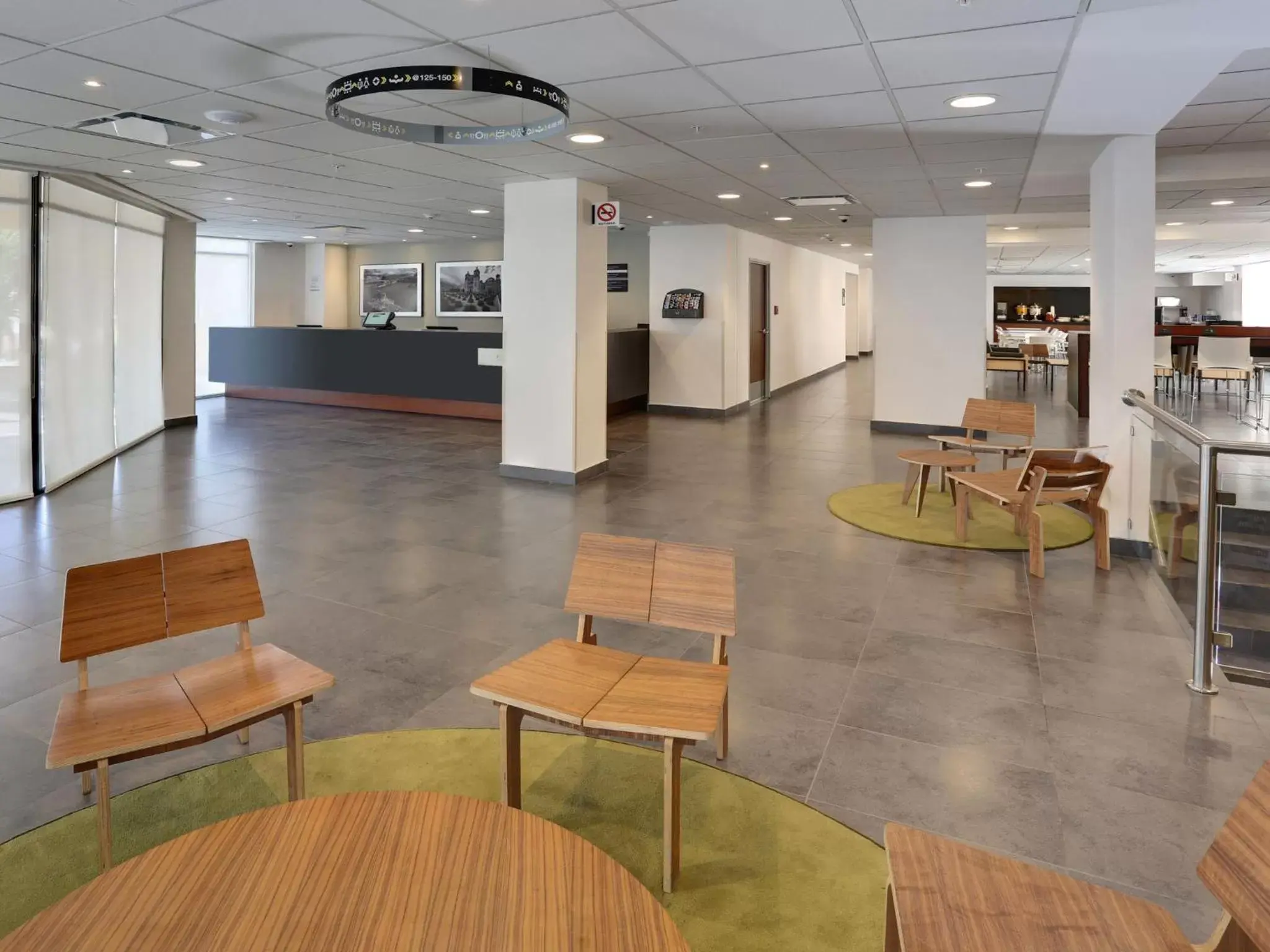 Communal lounge/ TV room, Lobby/Reception in City Express by Marriott Oaxaca