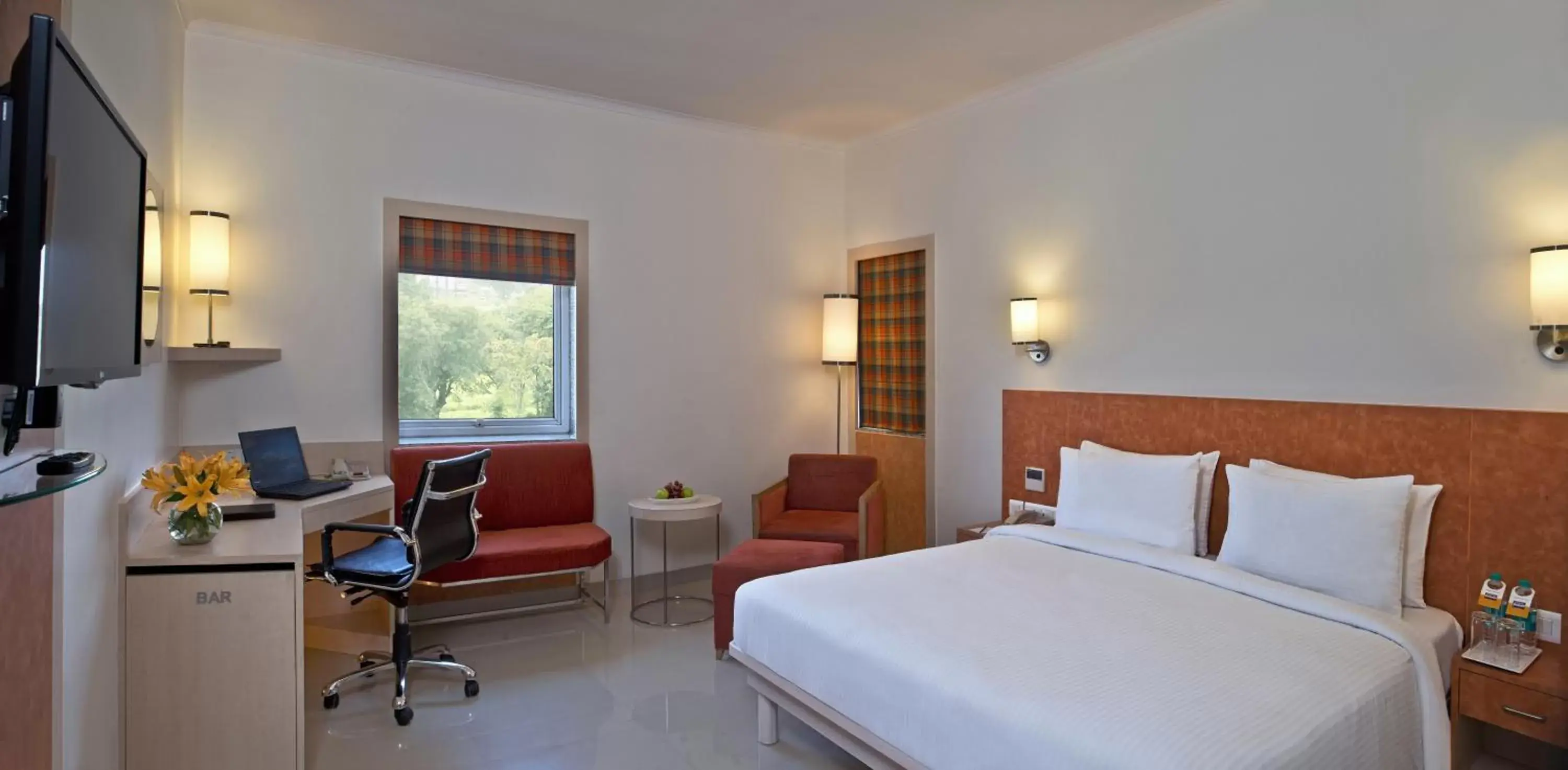 TV and multimedia, Bed in Nirwana Hometel Jaipur- A Sarovar Hotel