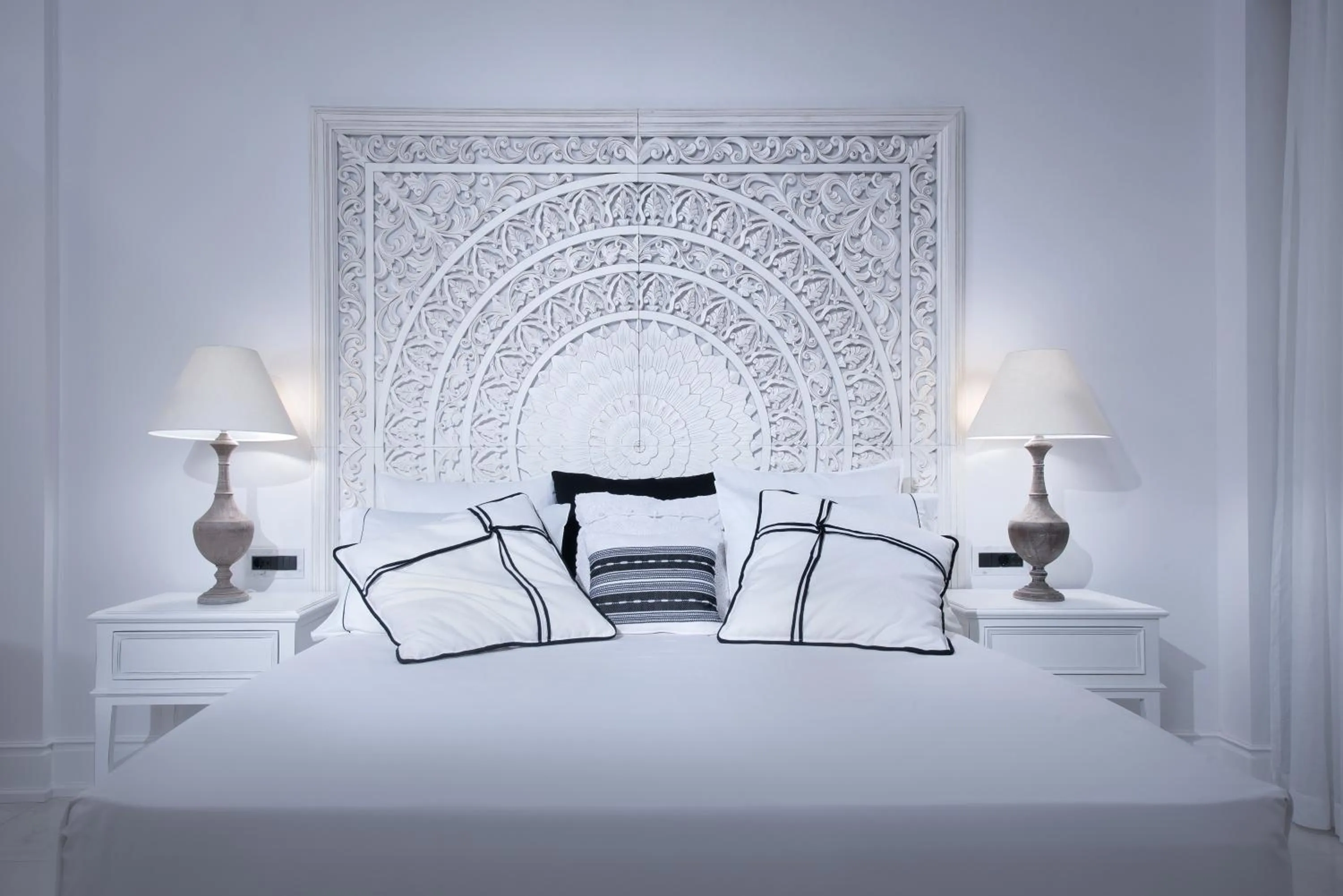 Bed in Abaton Island Resort & Spa