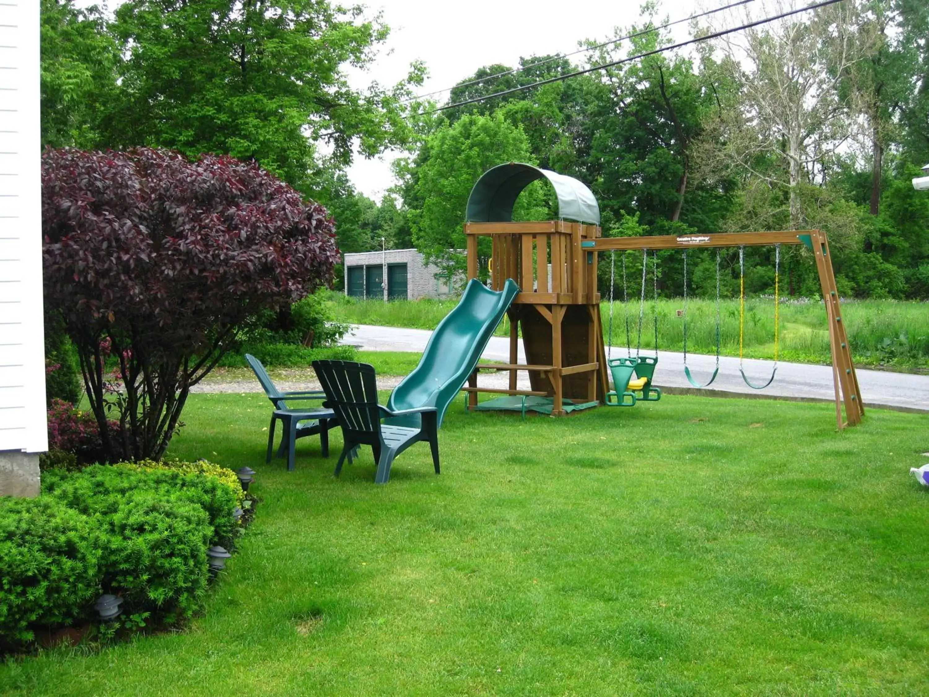 Children play ground, Garden in Knotty Pine Motel