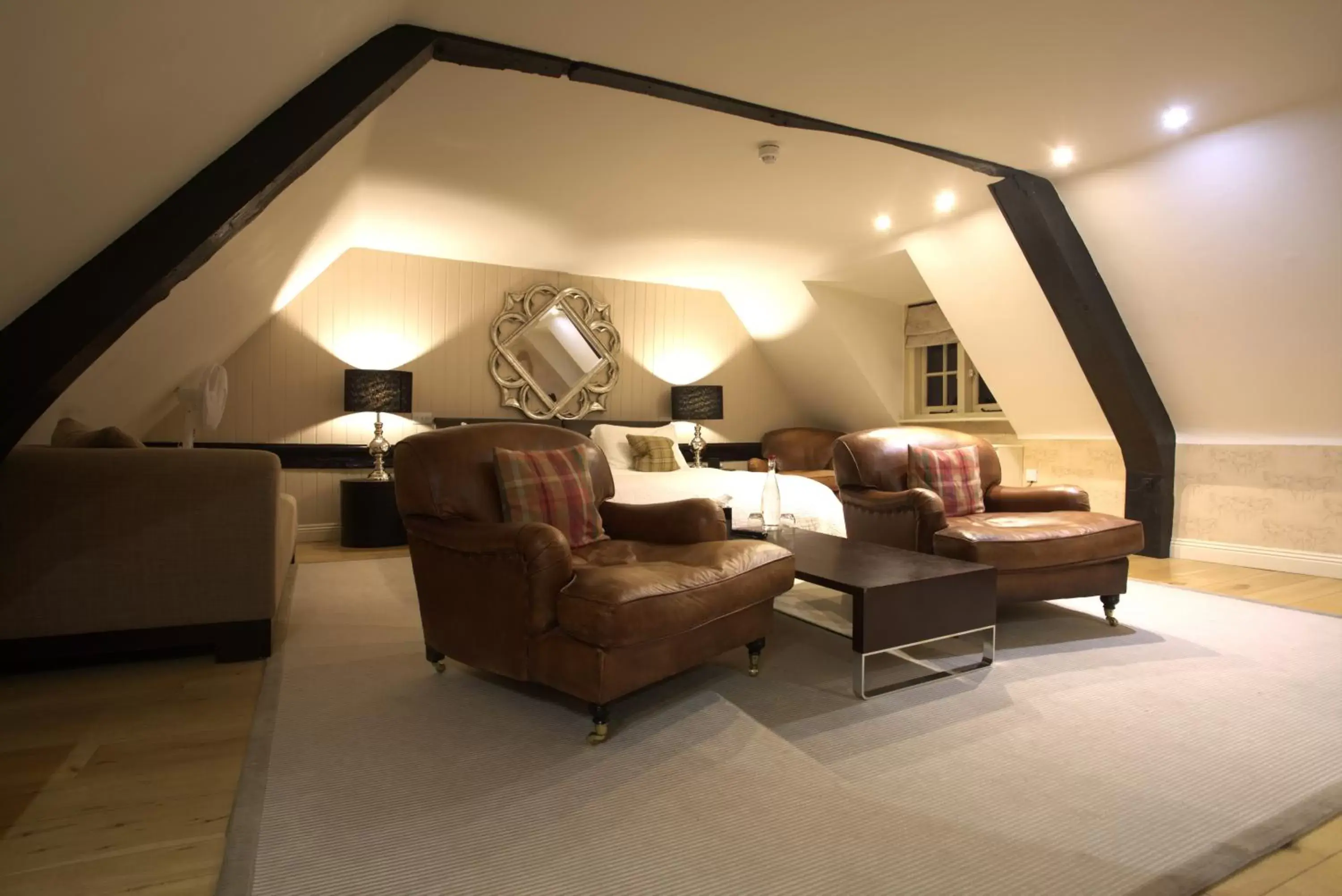 Bed, Seating Area in The White Horse Hotel, Romsey, Hampshire