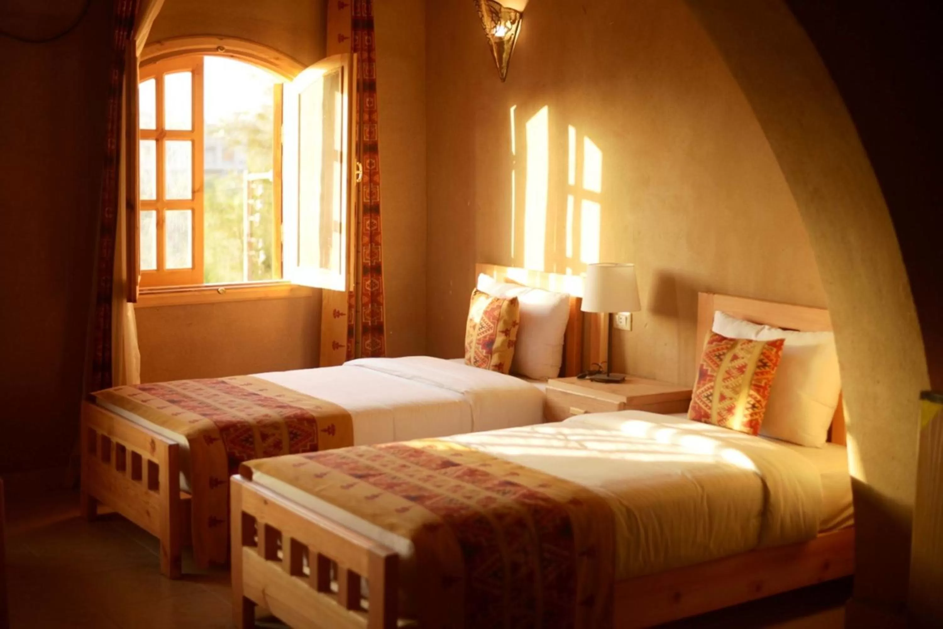 Bed in Embrace Hotel