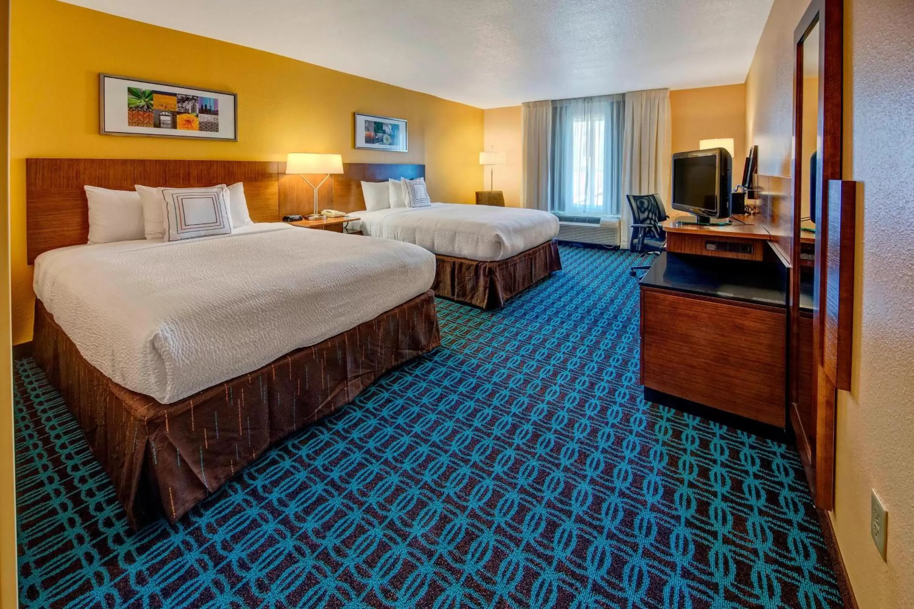 Photo of the whole room, Bed in Fairfield Inn and Suites by Marriott Orlando Near Universal Orlando