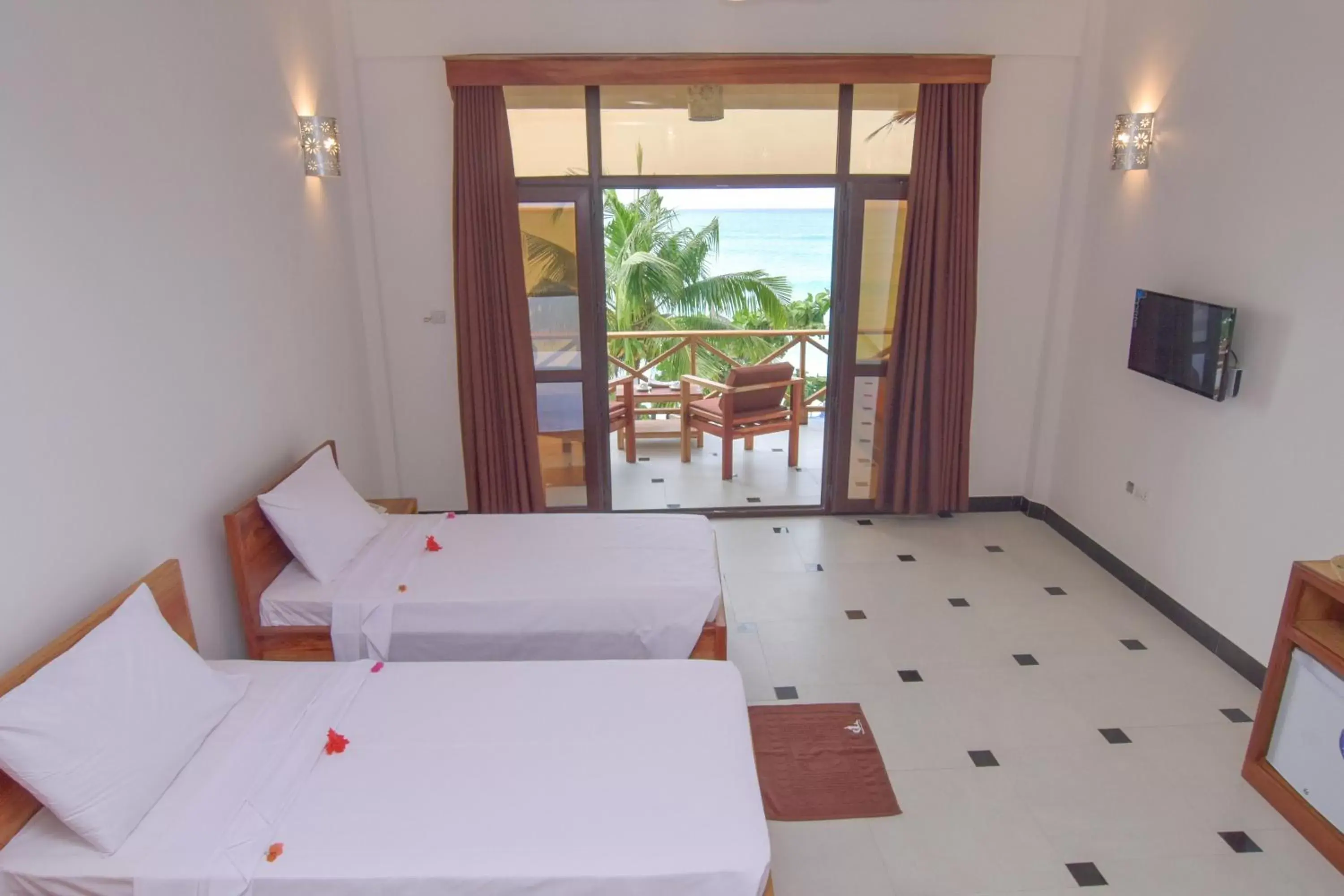 Balcony/Terrace, Bed in Mnarani Beach Cottages