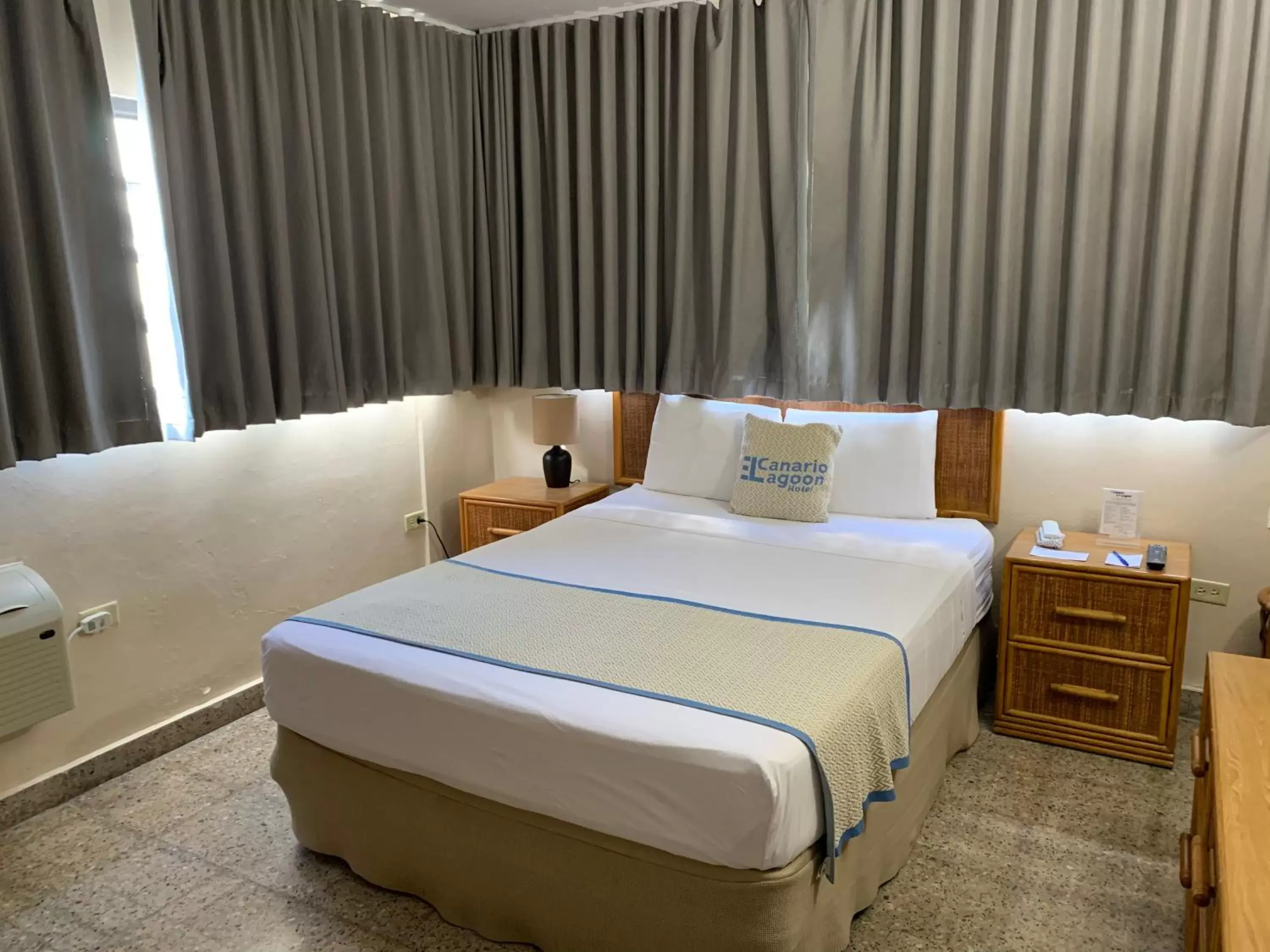 Bed in Canario Lagoon Hotel