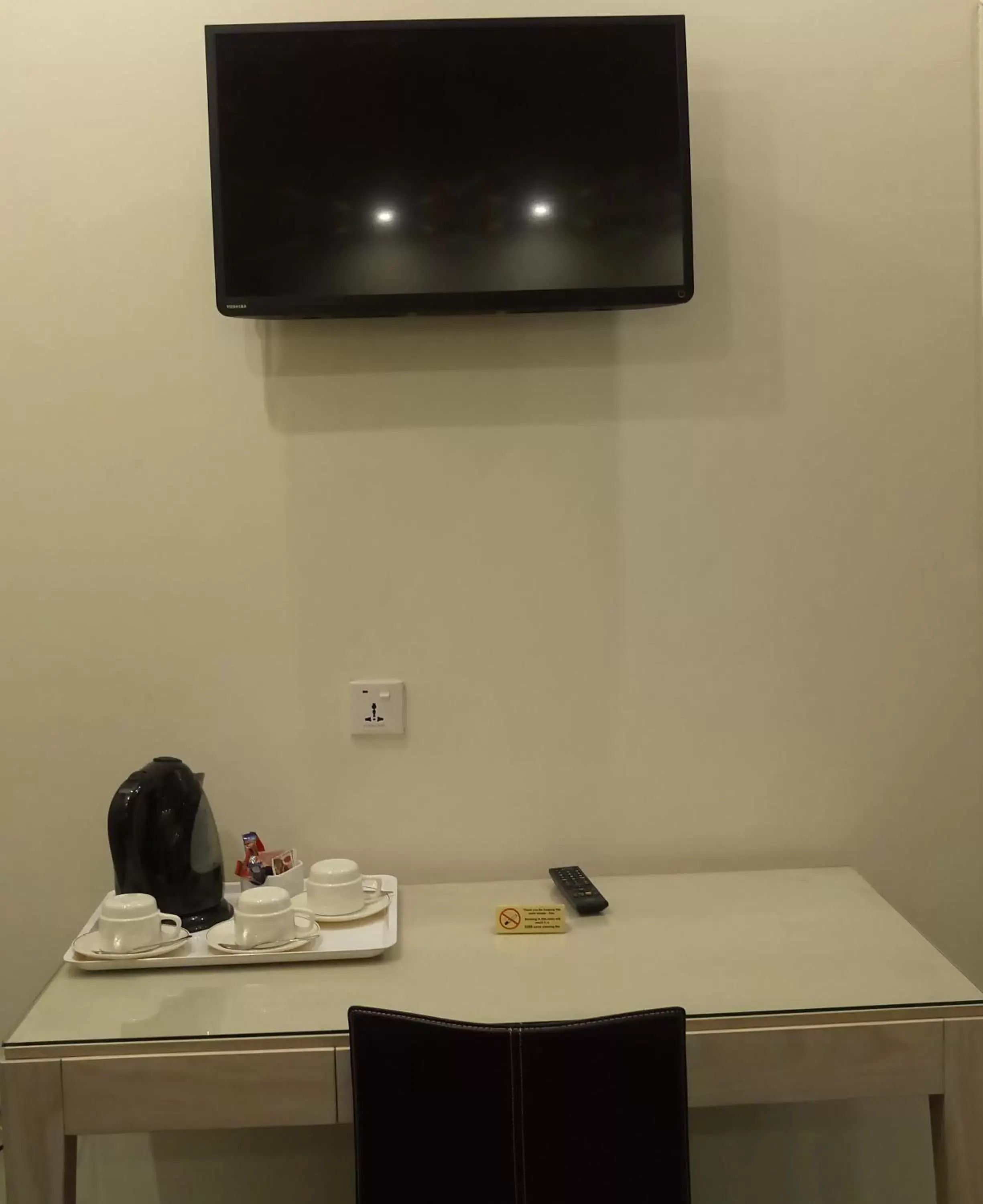TV and multimedia, TV/Entertainment Center in Castelli Hotel Nicosia