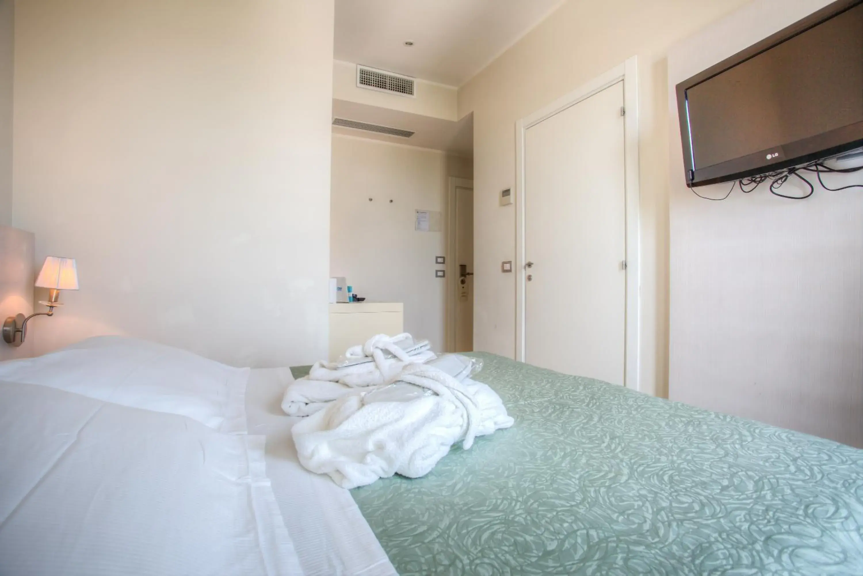Bed in Ferretti Beach Hotel