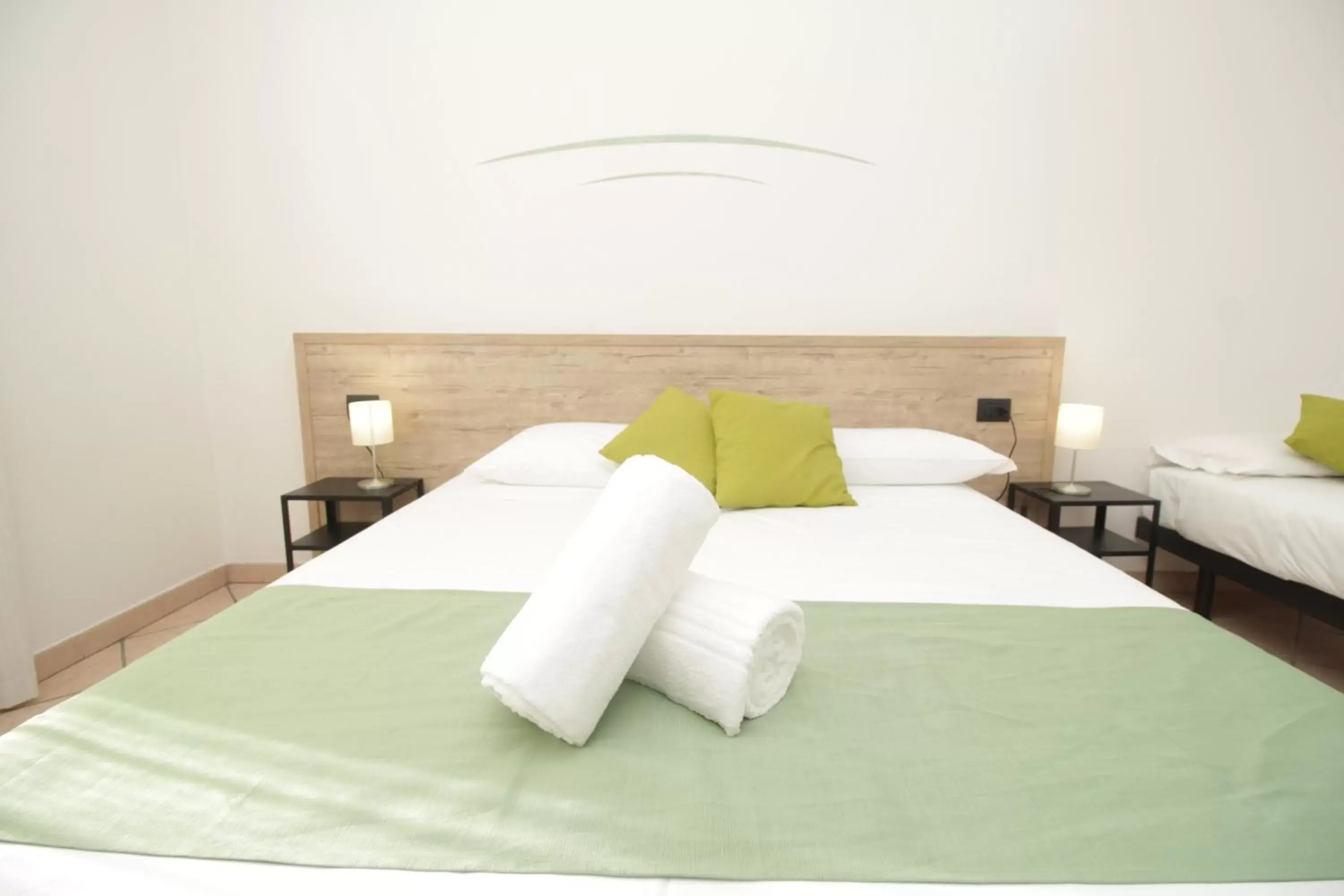 Bed in Hotel Tornielli 9