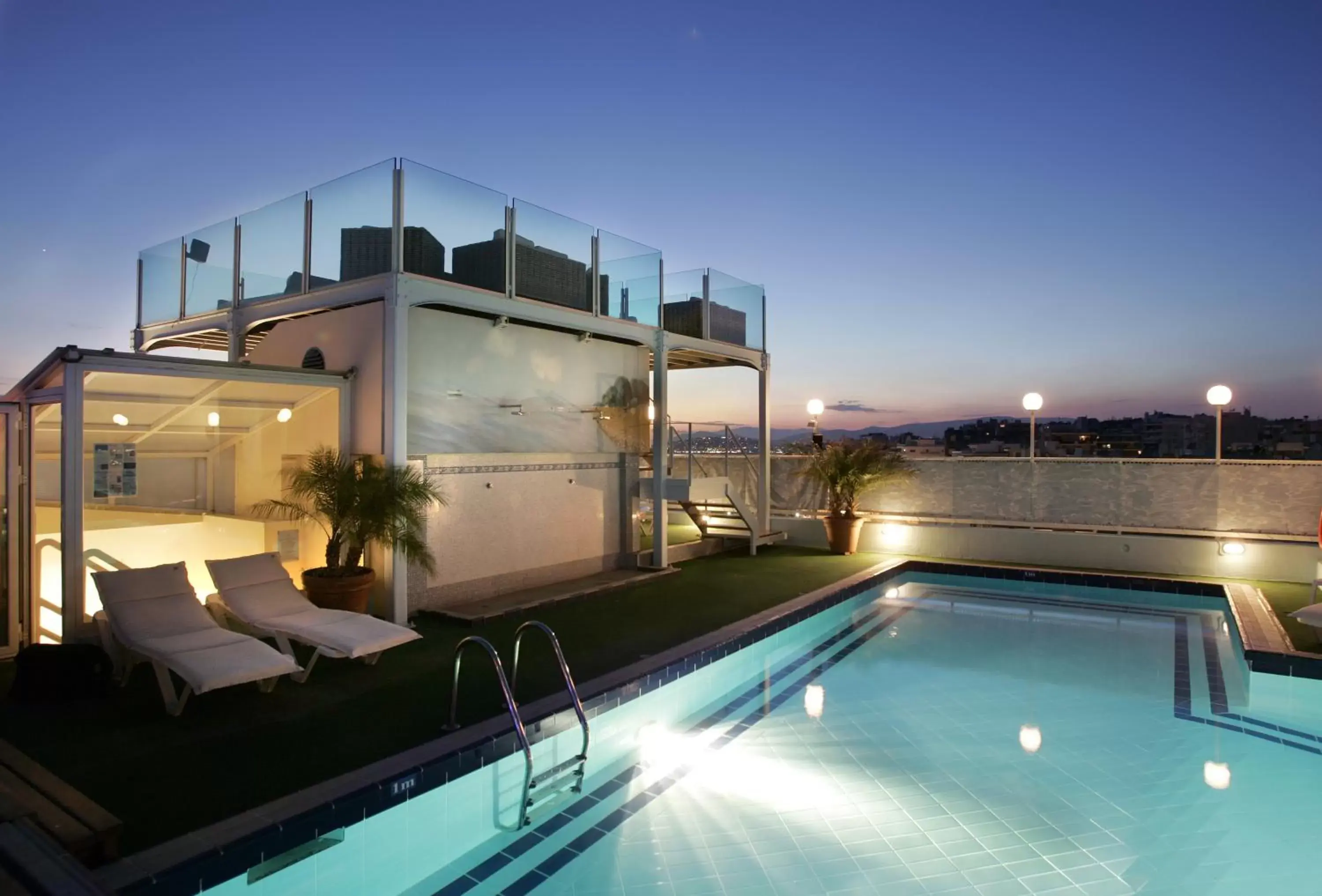 Balcony/Terrace, Swimming Pool in Poseidon Athens Hotel