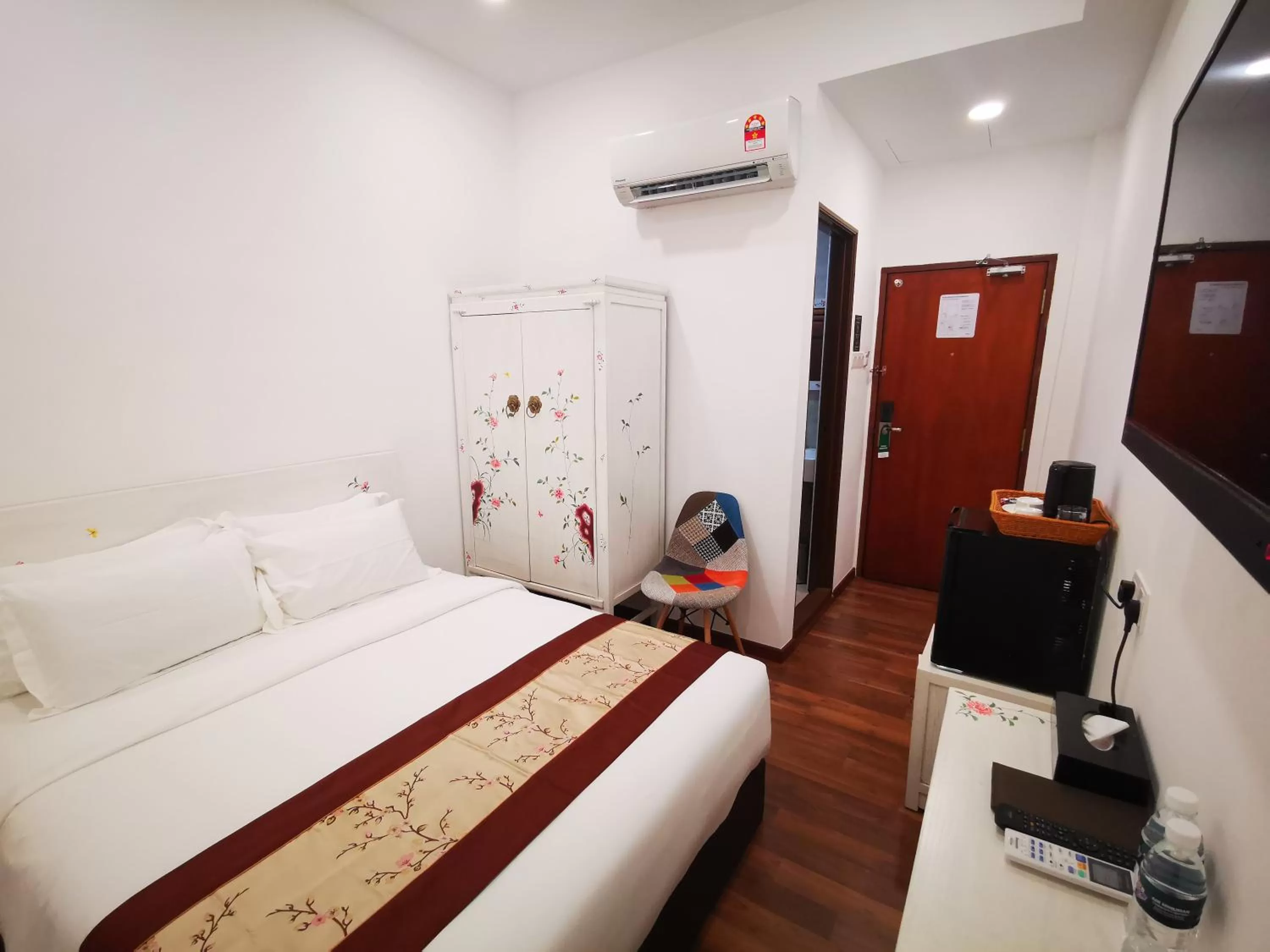 Bed in Mclane Boutique Hotel