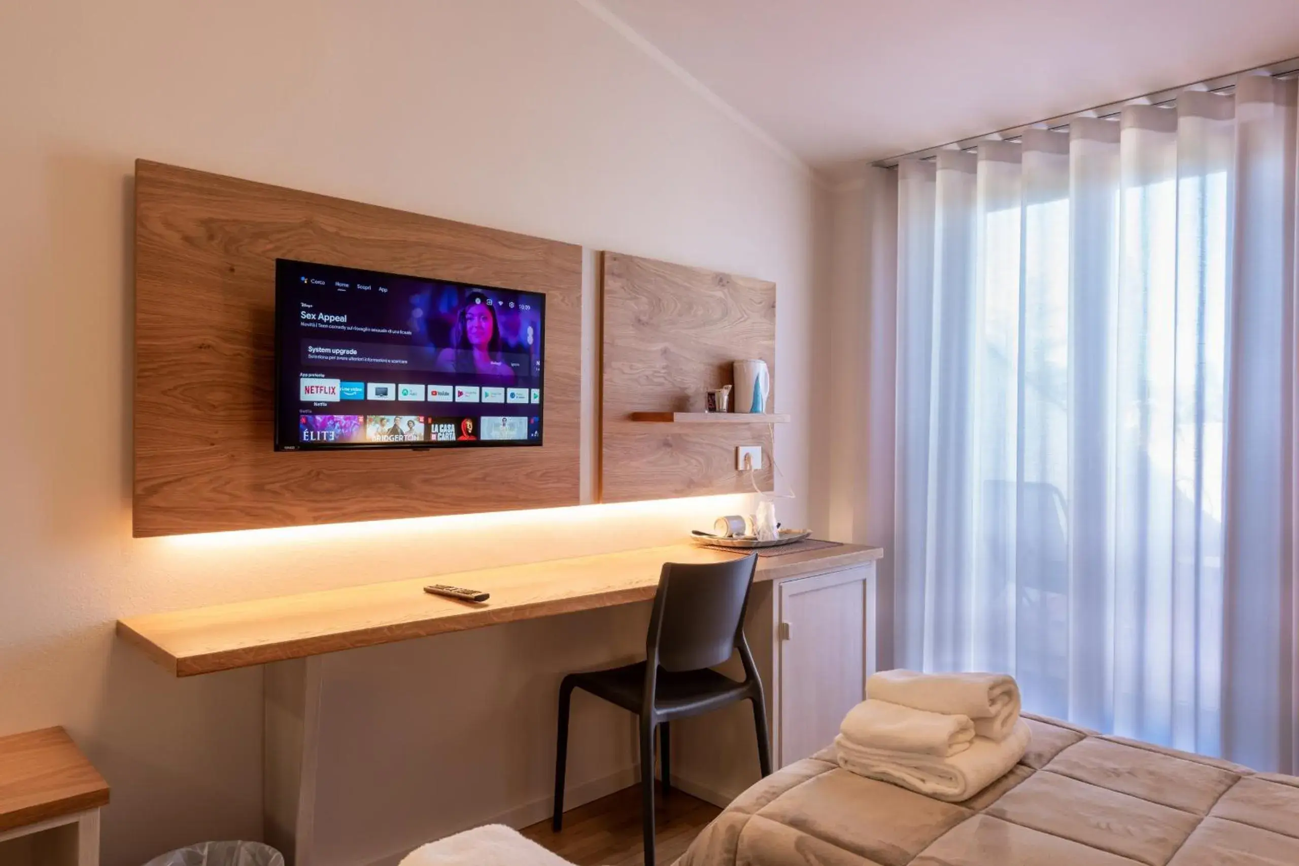 Bed, TV/Entertainment Center in Hotel Palazzuolo