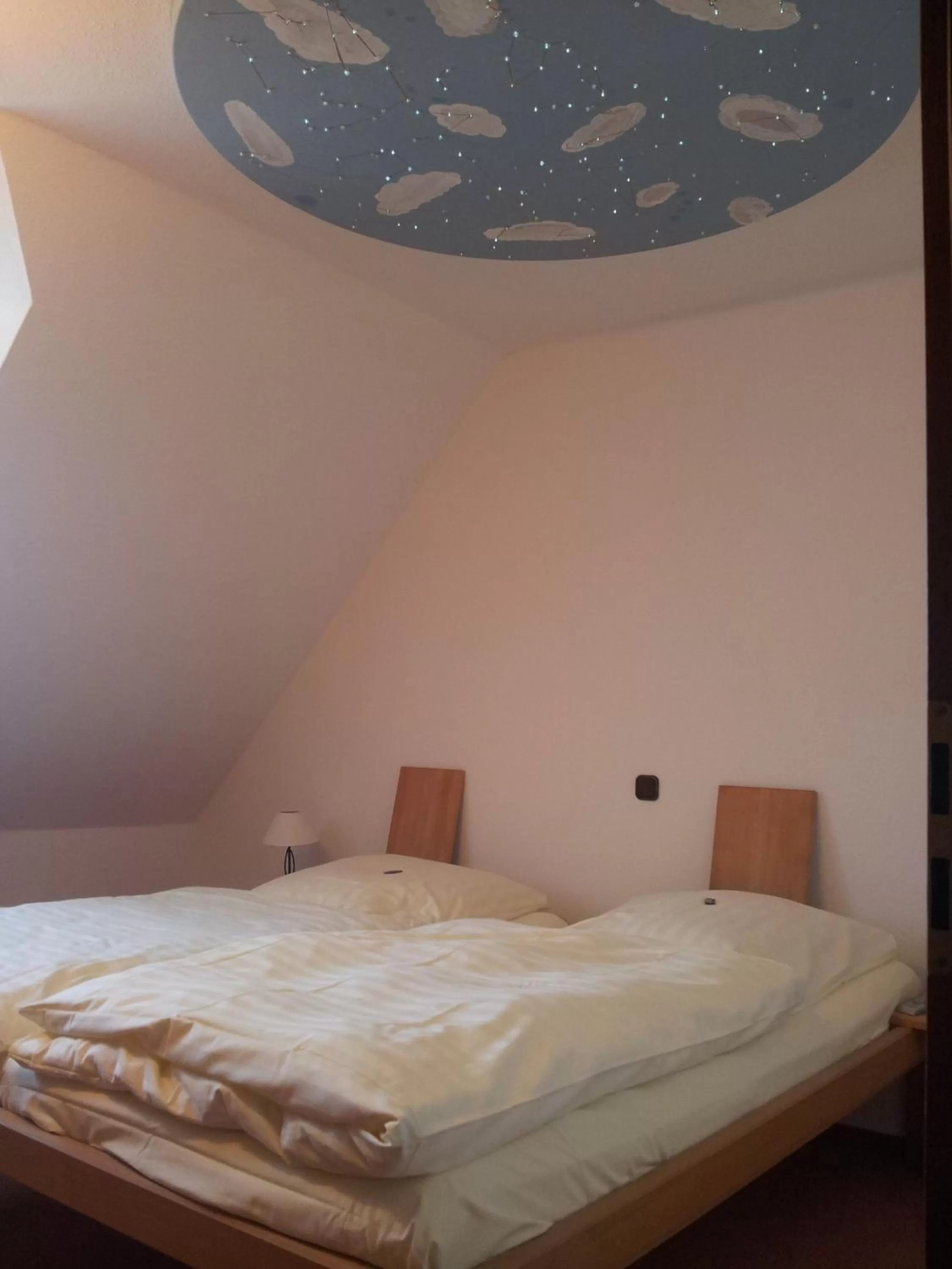 Photo of the whole room, Bed in Hotel Goldflair am Rathaus