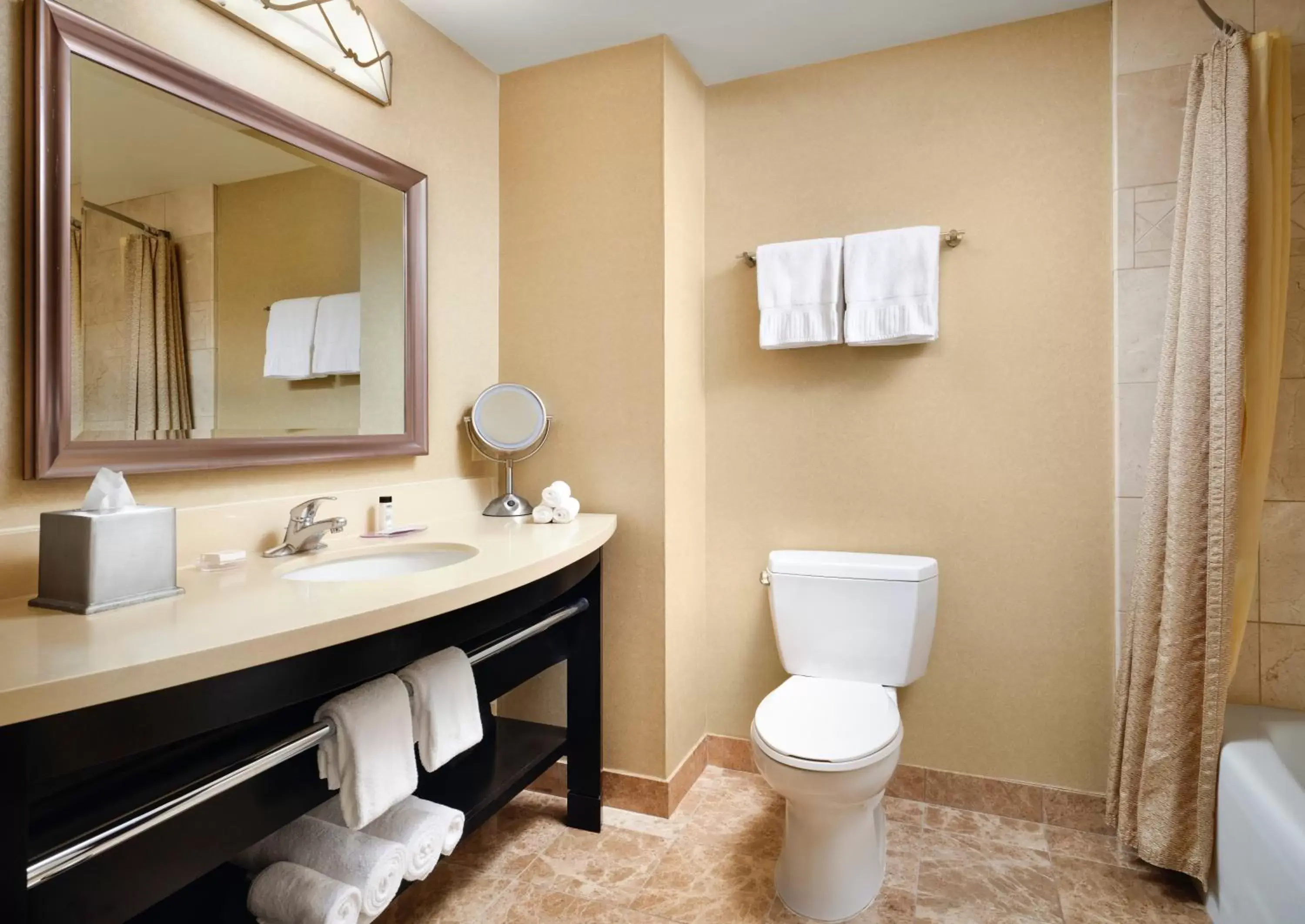 Bathroom in West Inn & Suites Bathroom in West Inn & Suites