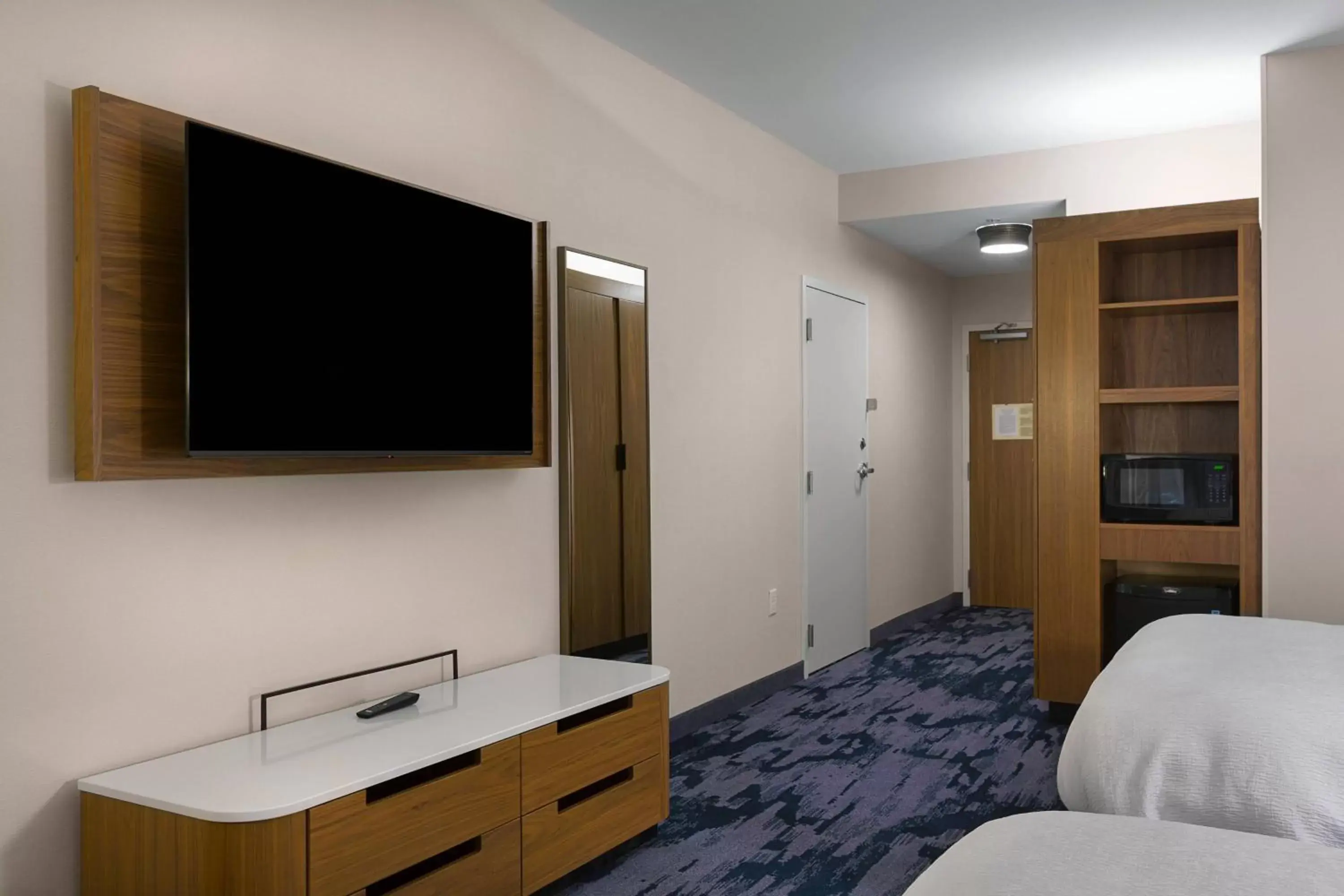 Photo of the whole room, TV/Entertainment Center in Fairfield by Marriott Inn & Suites Statesville