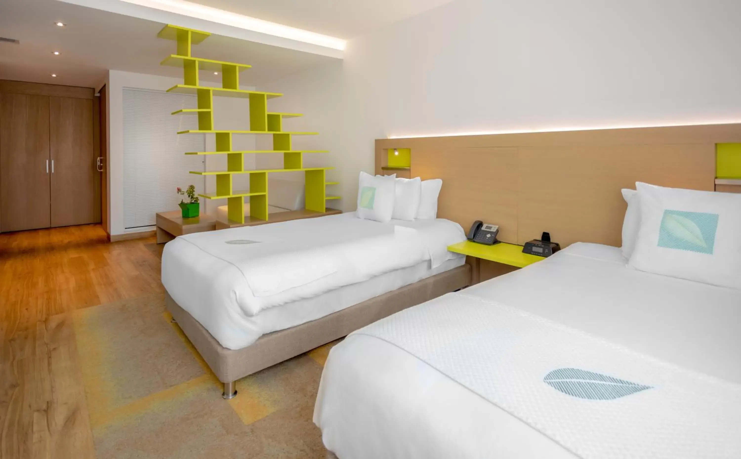 Bed in Biohotel Organic Suites