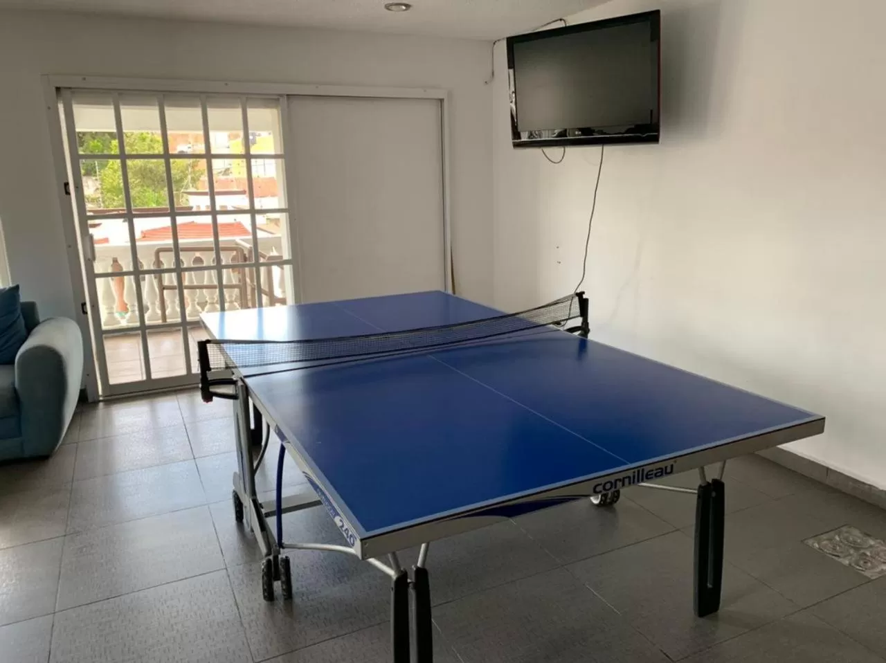 Table tennis in La Aurora Hotel Like Home