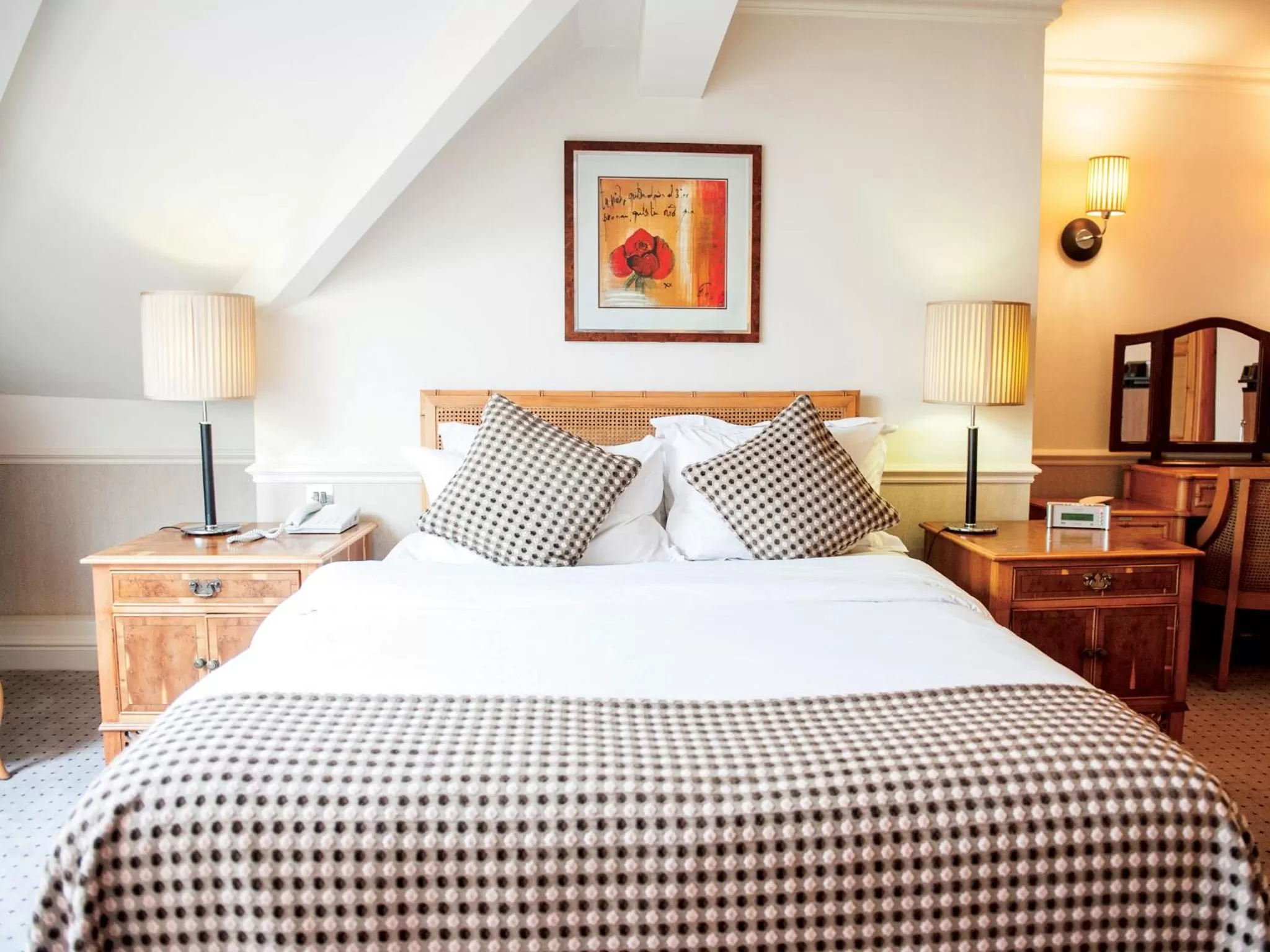 Bed in Cottons Hotel and Spa