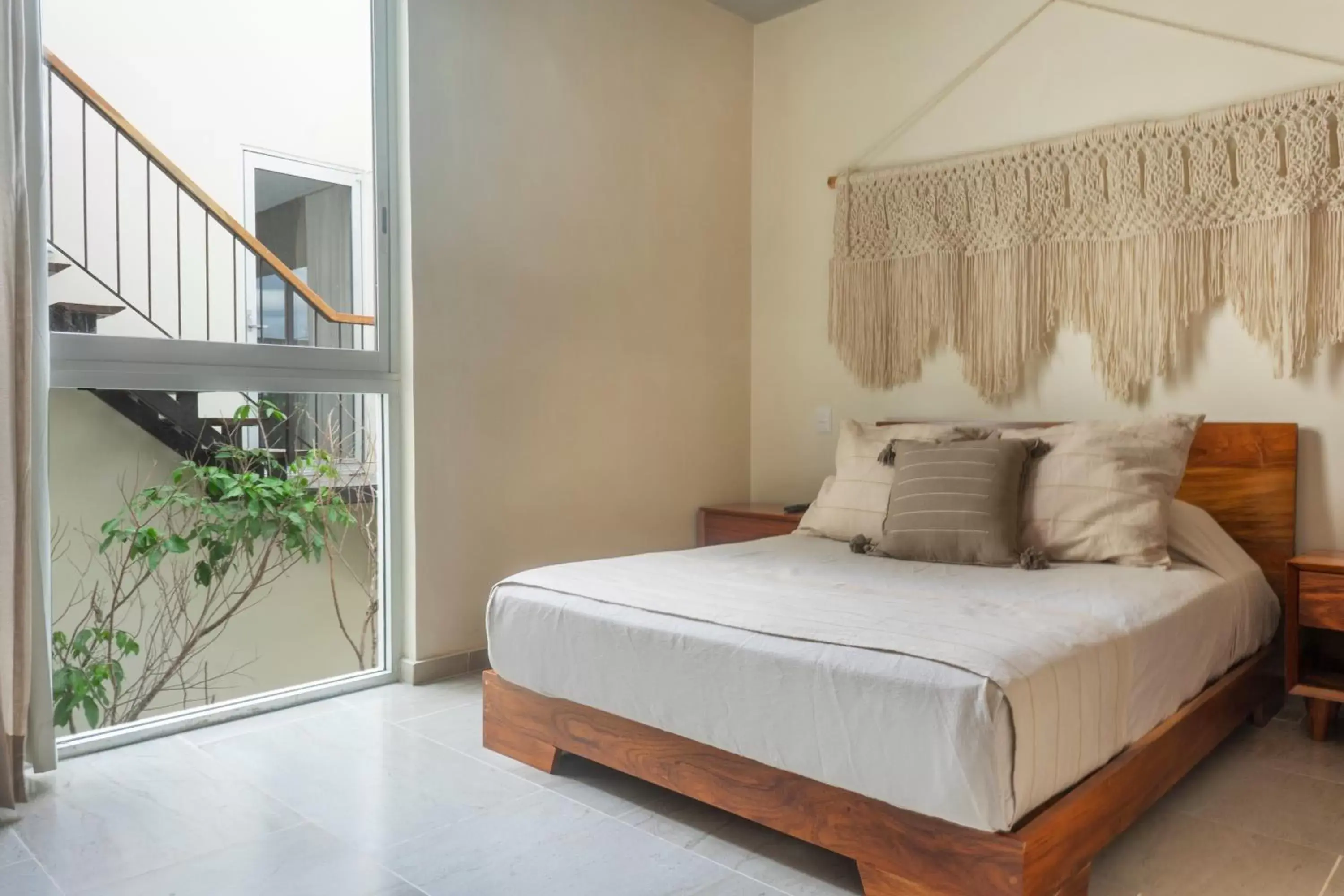 Bed in ARUNA TULUM-Luxury Studios & Apartments