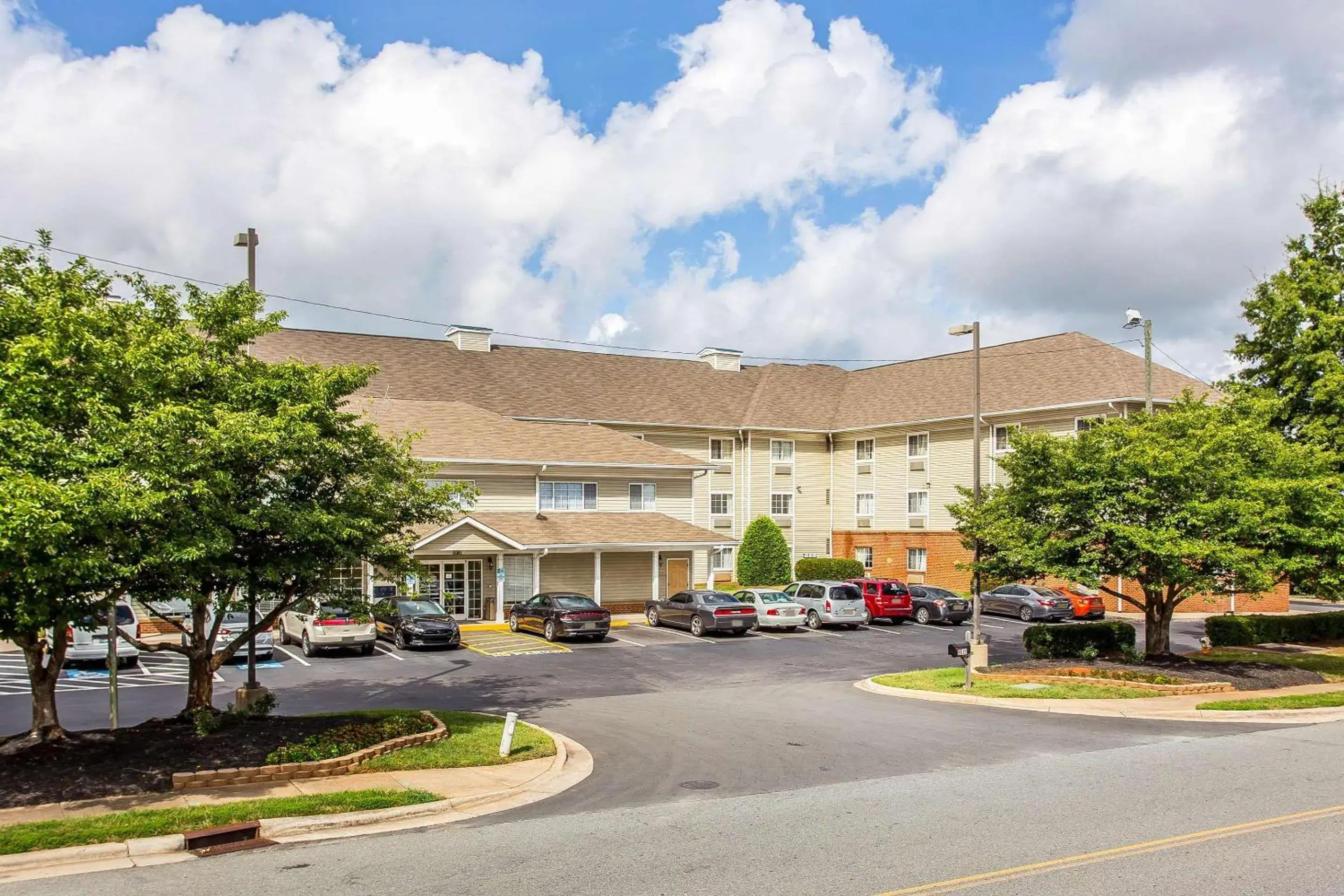 Property Building in Suburban Studios near University of North Carolina-Charlotte