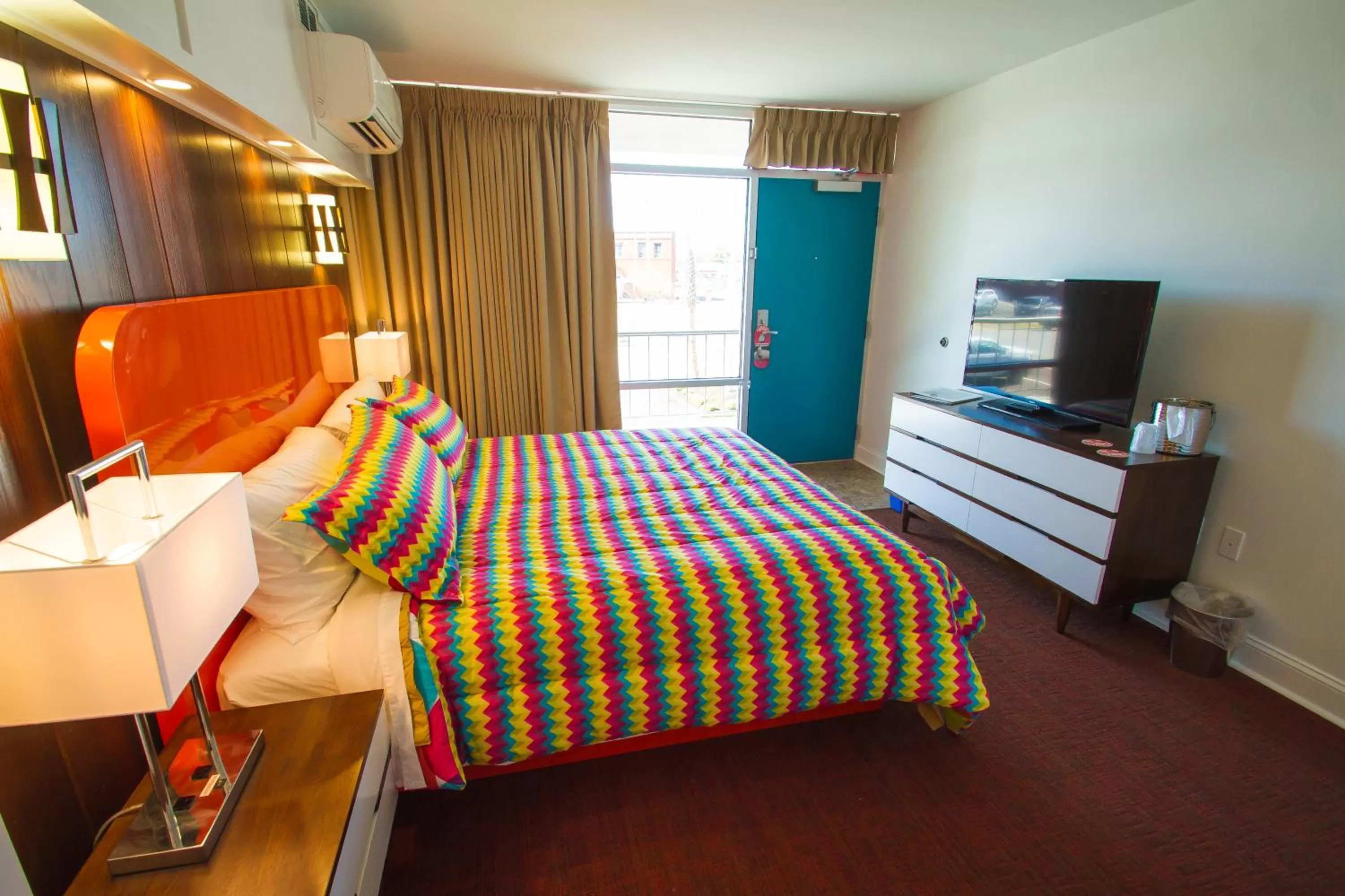 Photo of the whole room, Bed in Mother Earth Motor Lodge