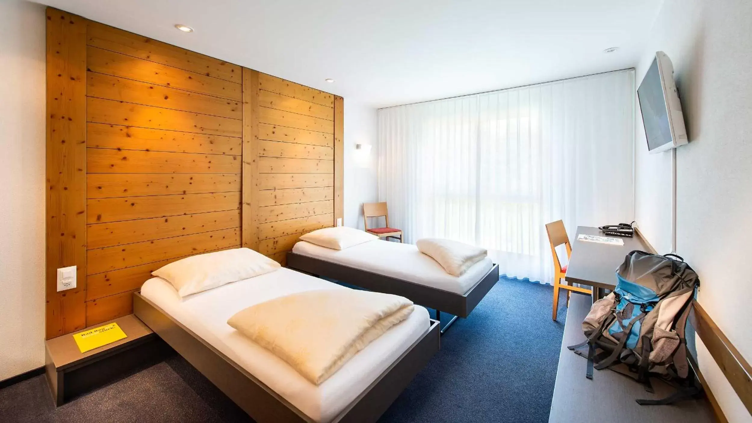 Photo of the whole room, Bed in Swiss Heidi Hotel