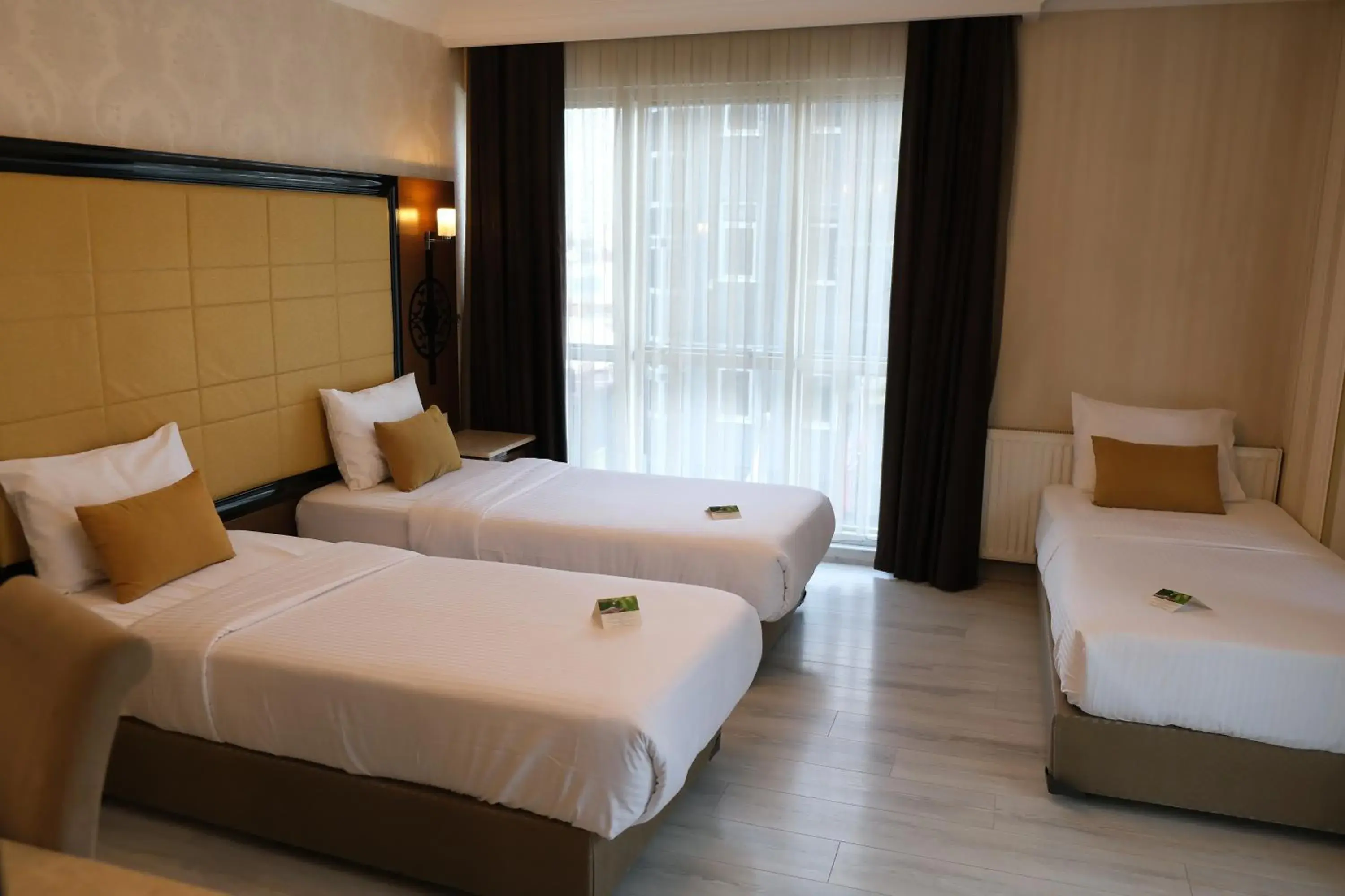 Bed in Asia City Hotel